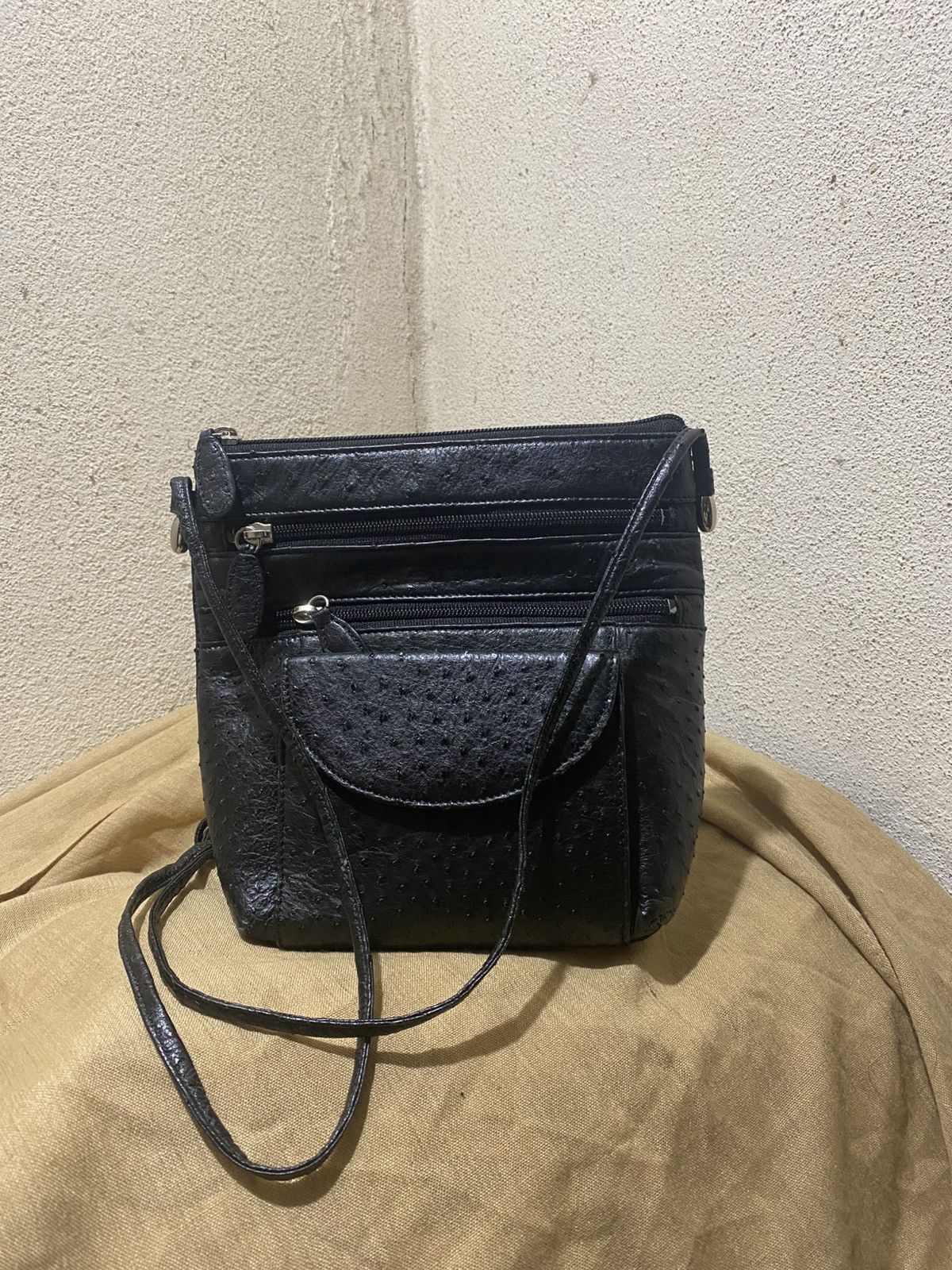 Genuine ostrich leather sling bag