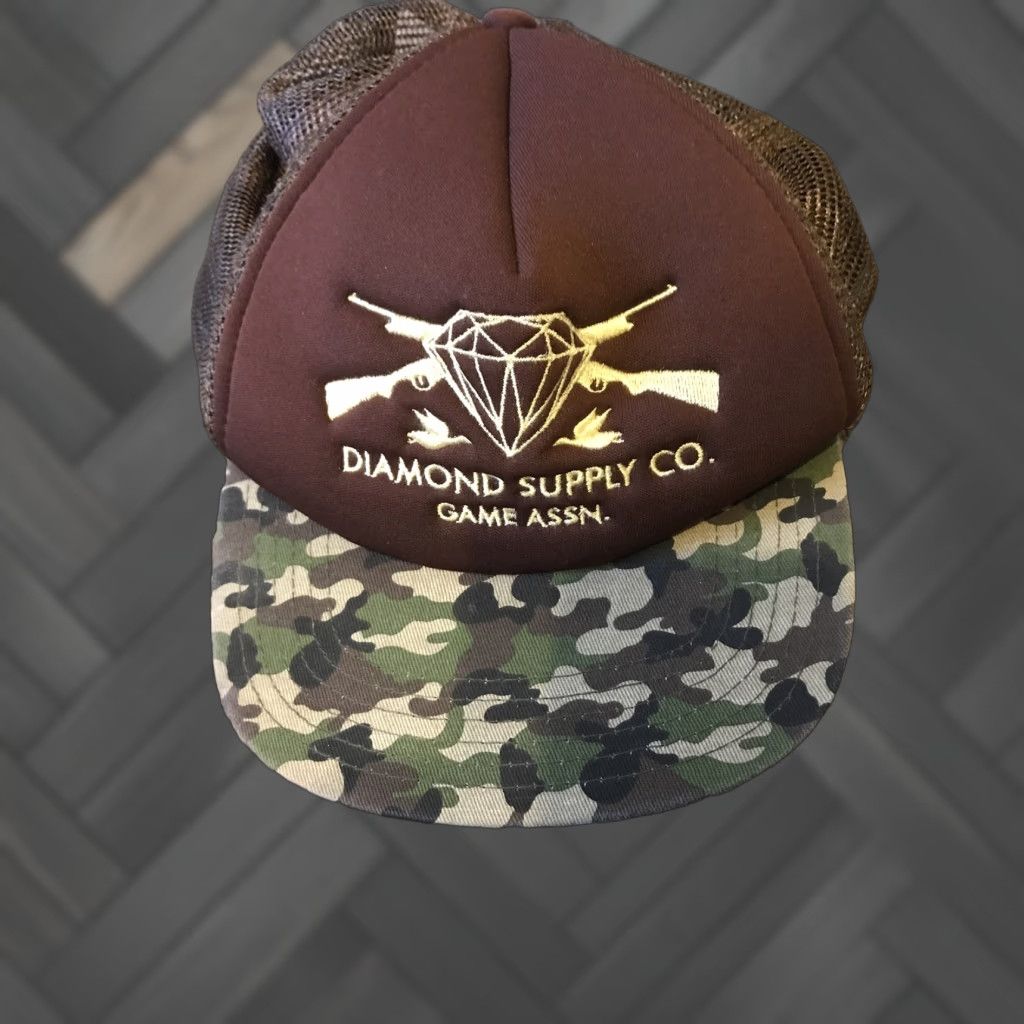 Diamond Supply Co. Diamond Supply Co Game Assn. Guns Trucker Snapback Hat Brown Camo Brown Camo Snapback Men One Size Colorful Hats Mens Size ONE SIZE - 1 Thumbnail