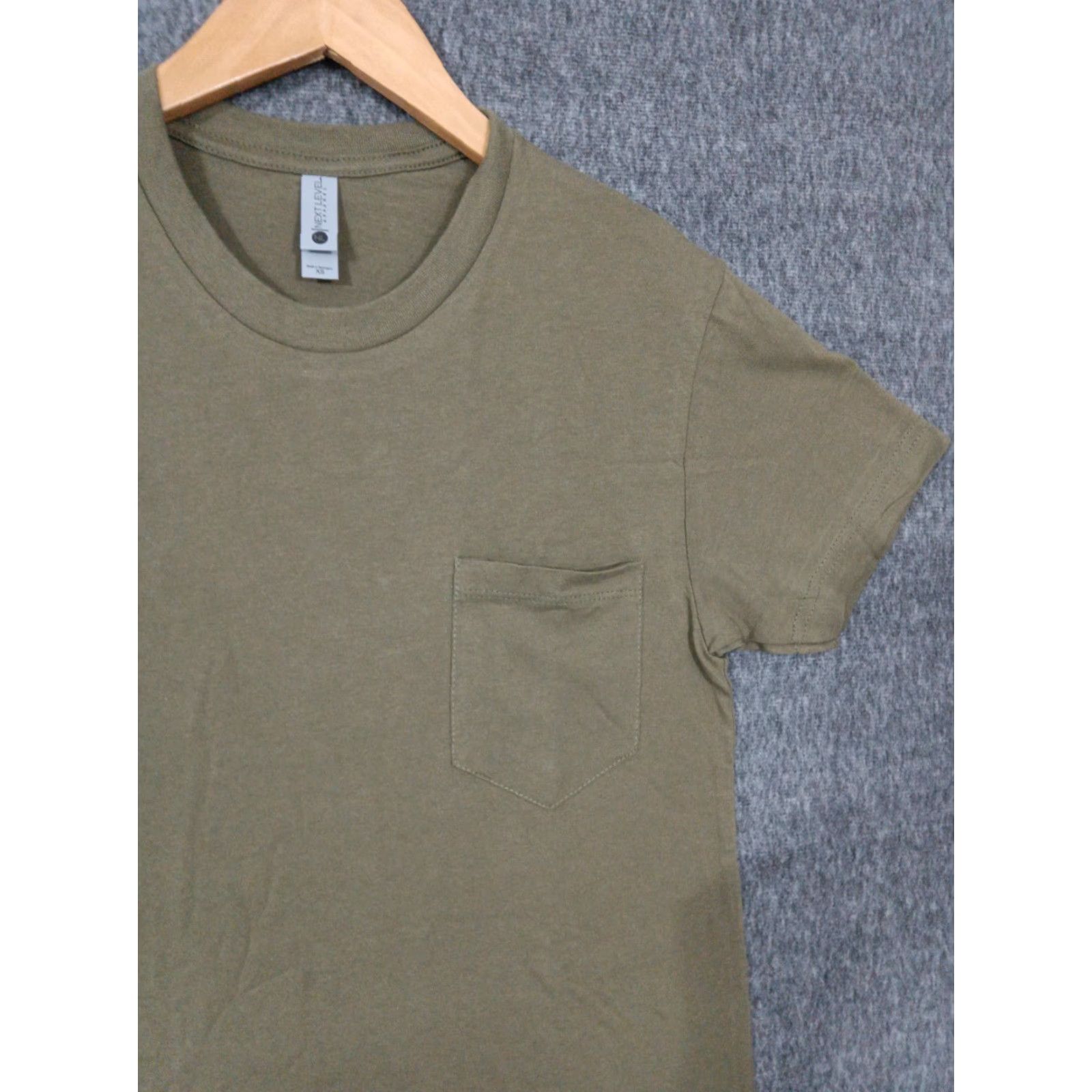 Next Level Next Level Crew Neck T-Shirt XS Olive Unisex Size XS Color Green 2-Pack Solid Short Sleeve 60% Cotton 40% Polyester Jersey Nike Shirt Size US XS / EU 42 / 0 - 6 Thumbnail