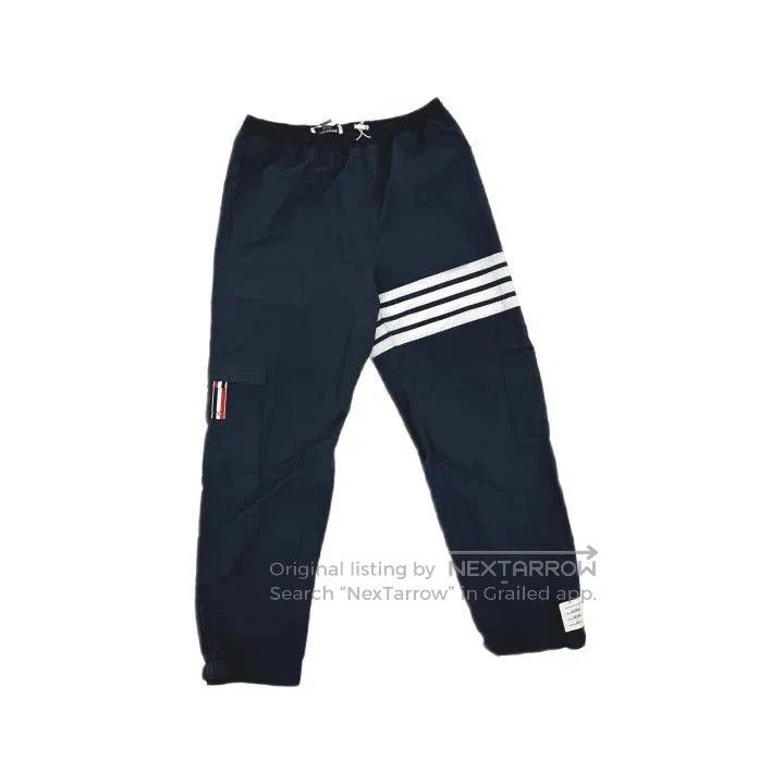 Thom Browne Classic Striped Loose Shorts for Spring.