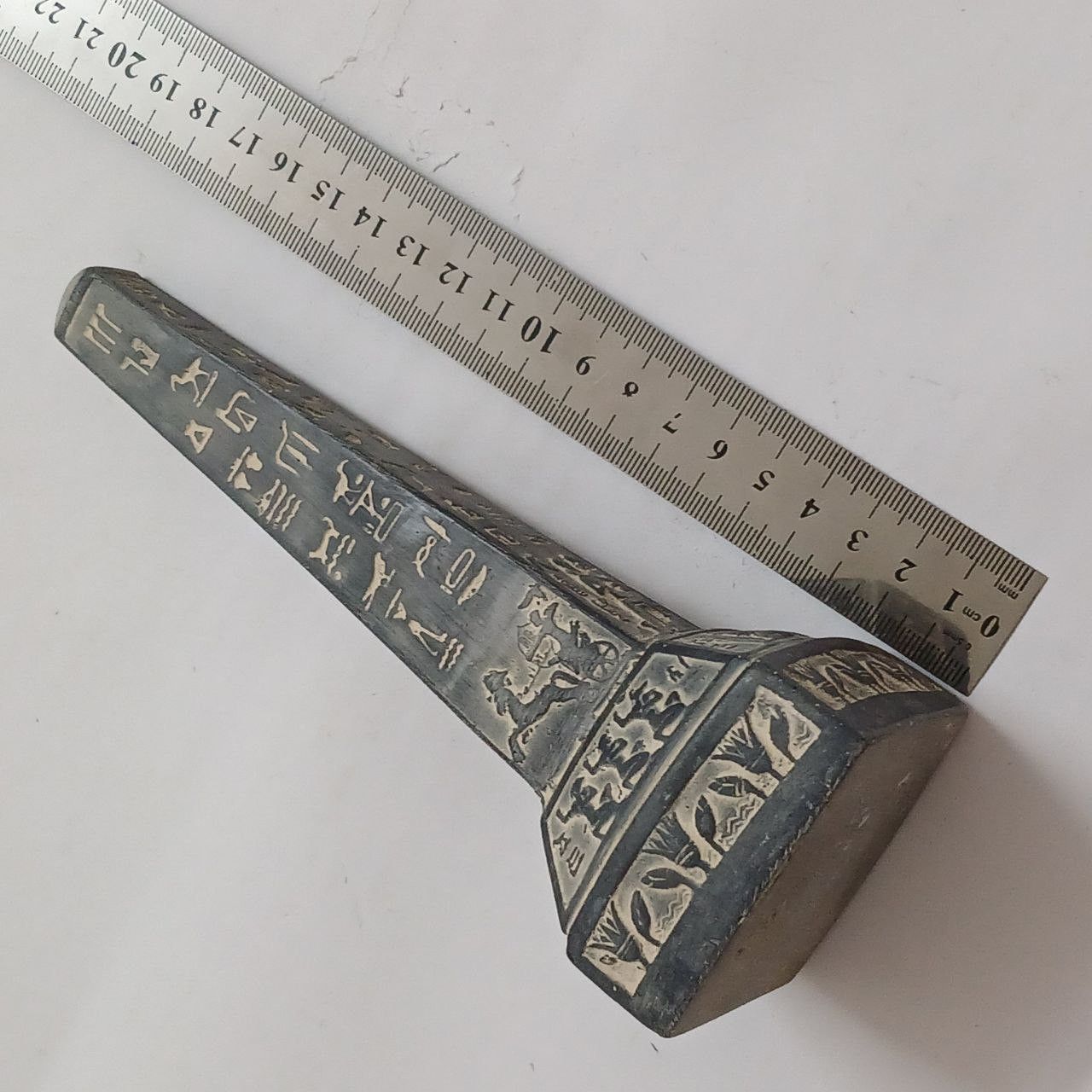 Pharaonic obelisk with hieroglyphs