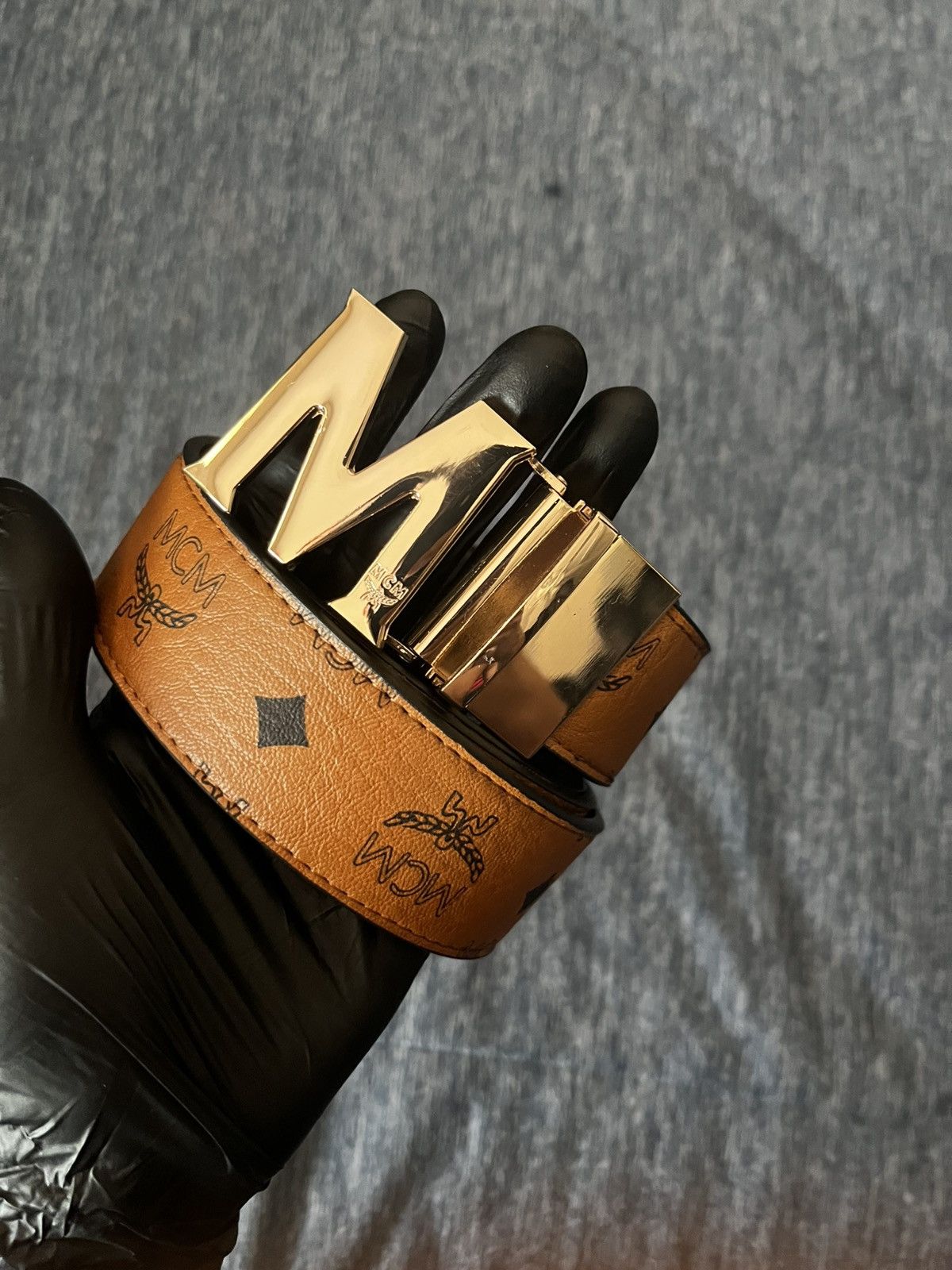 Light brown and gold belt
