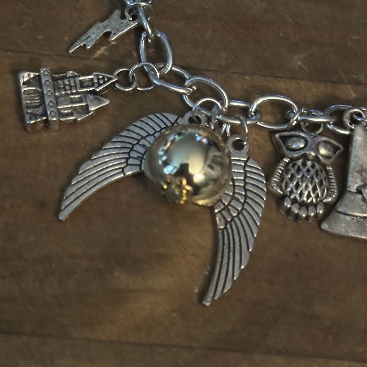 Other Silver tone charm bracelet with assorted charms Size ONE SIZE - 6 Thumbnail