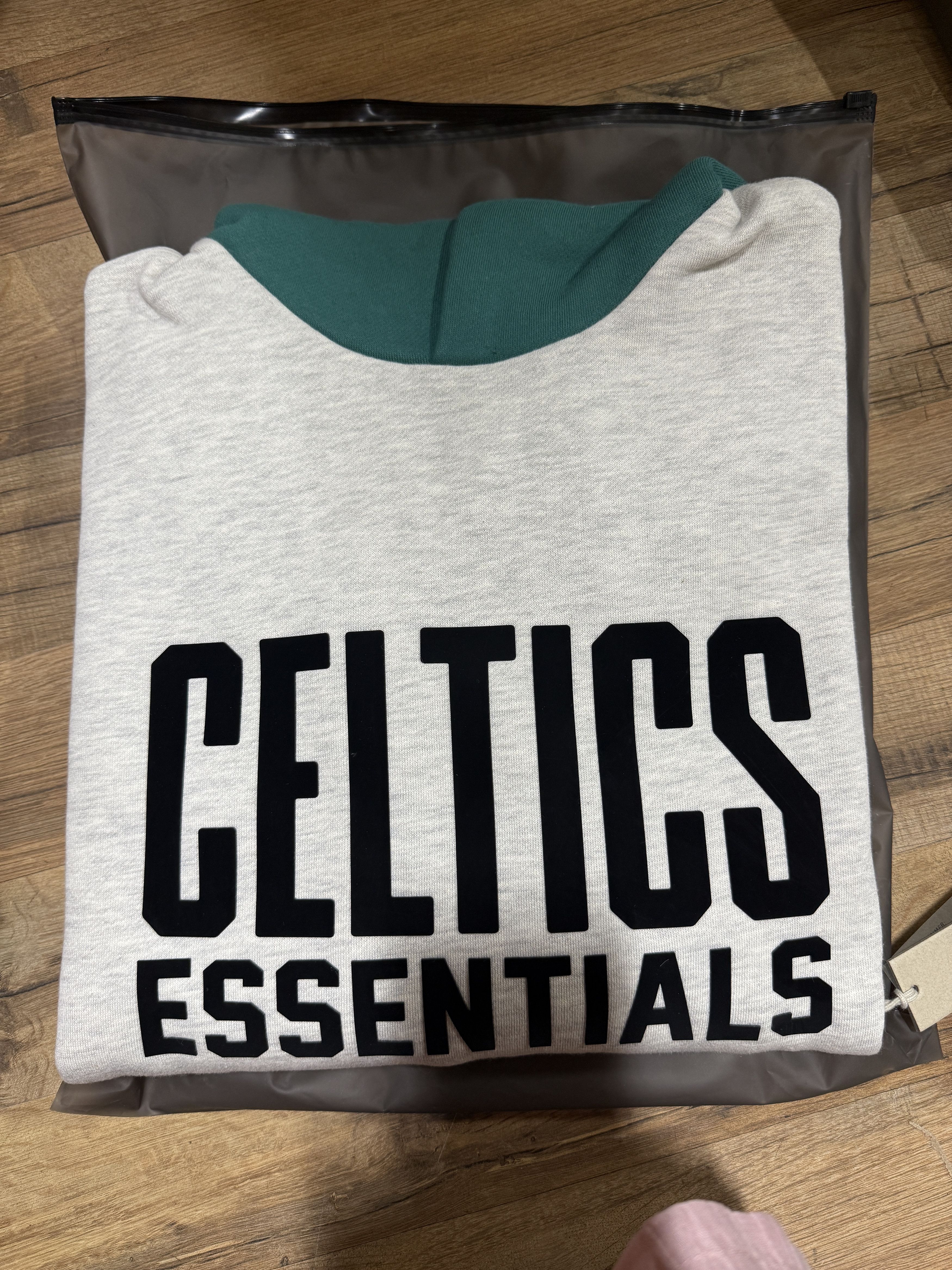 Fear of God × NBA Fear of God Essentials NBA Celtics Hoodie Light Heather (XS) Size US XS / EU 42 / 0 - 4 Thumbnail