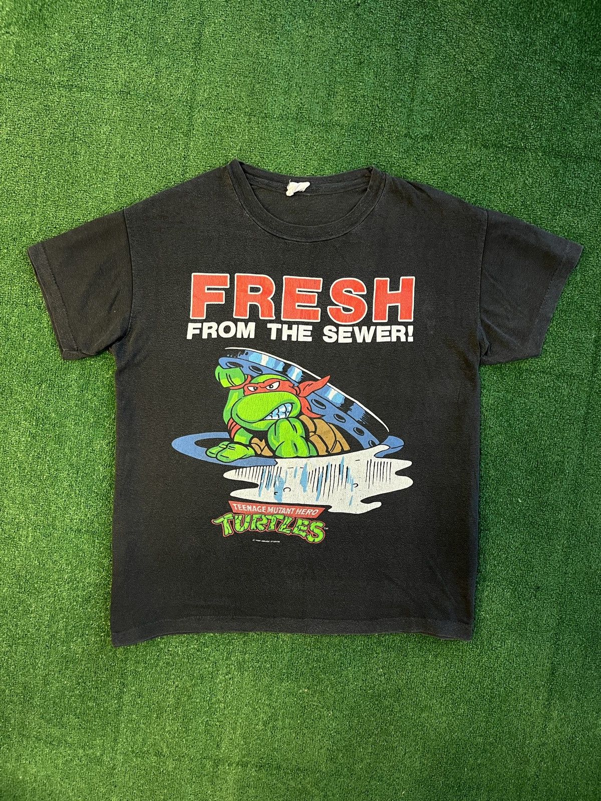 image of Cartoon Network x Vintage 1989 Teenage Mutant Ninja Turtles Hero Fresh Tee in Faded Black (Size Med