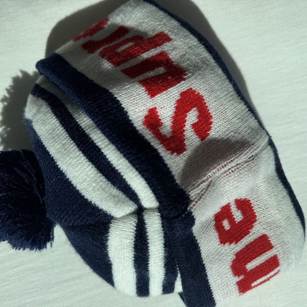 Supreme SUPREME NAVY STRIPE ACRYLIC POM BEANIE W RED LOGO Size ONE SIZE - 7 Thumbnail
