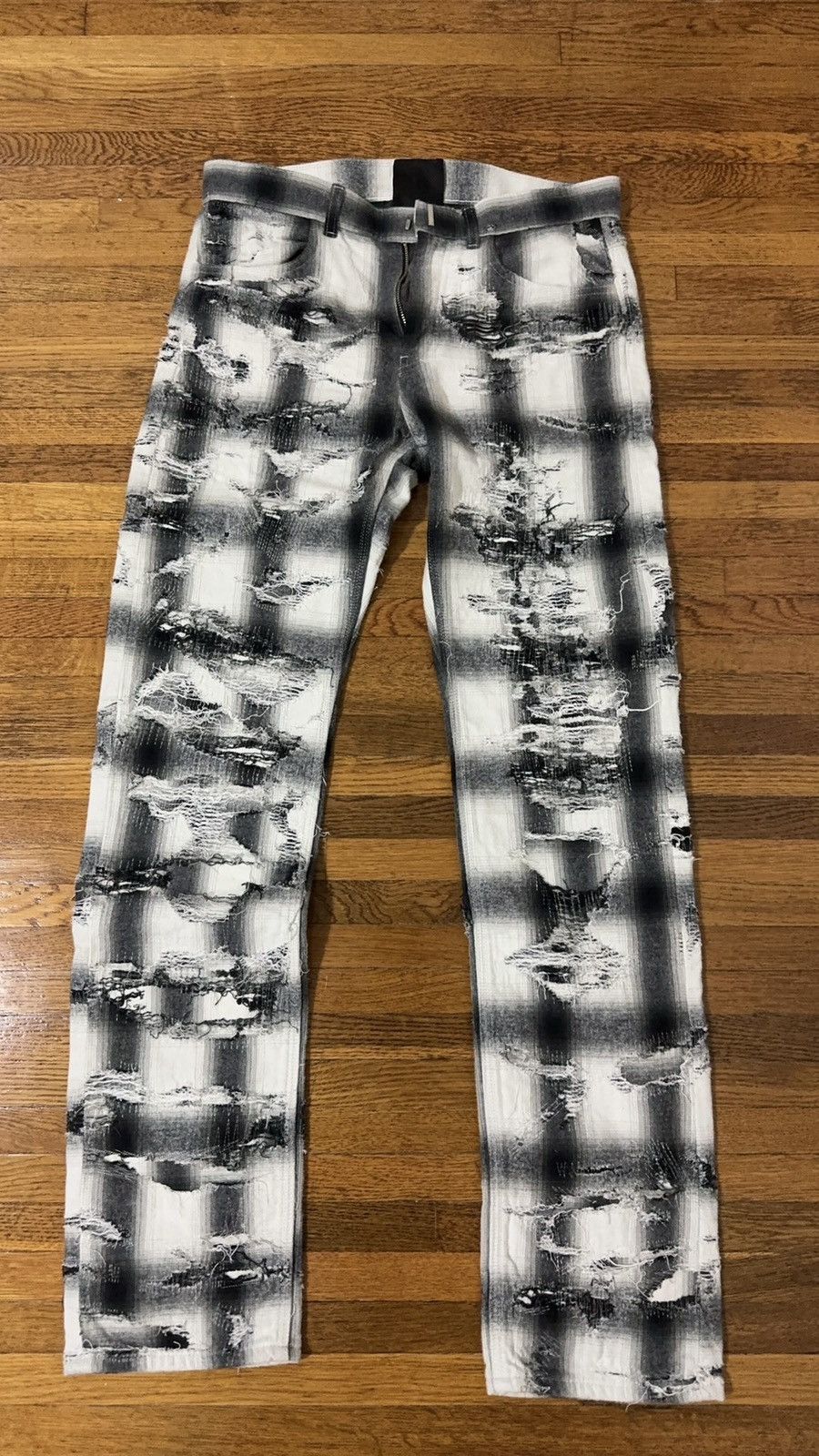 image of Givenchy Distressed Denim Pants in Black/White, Men's (Size 31)