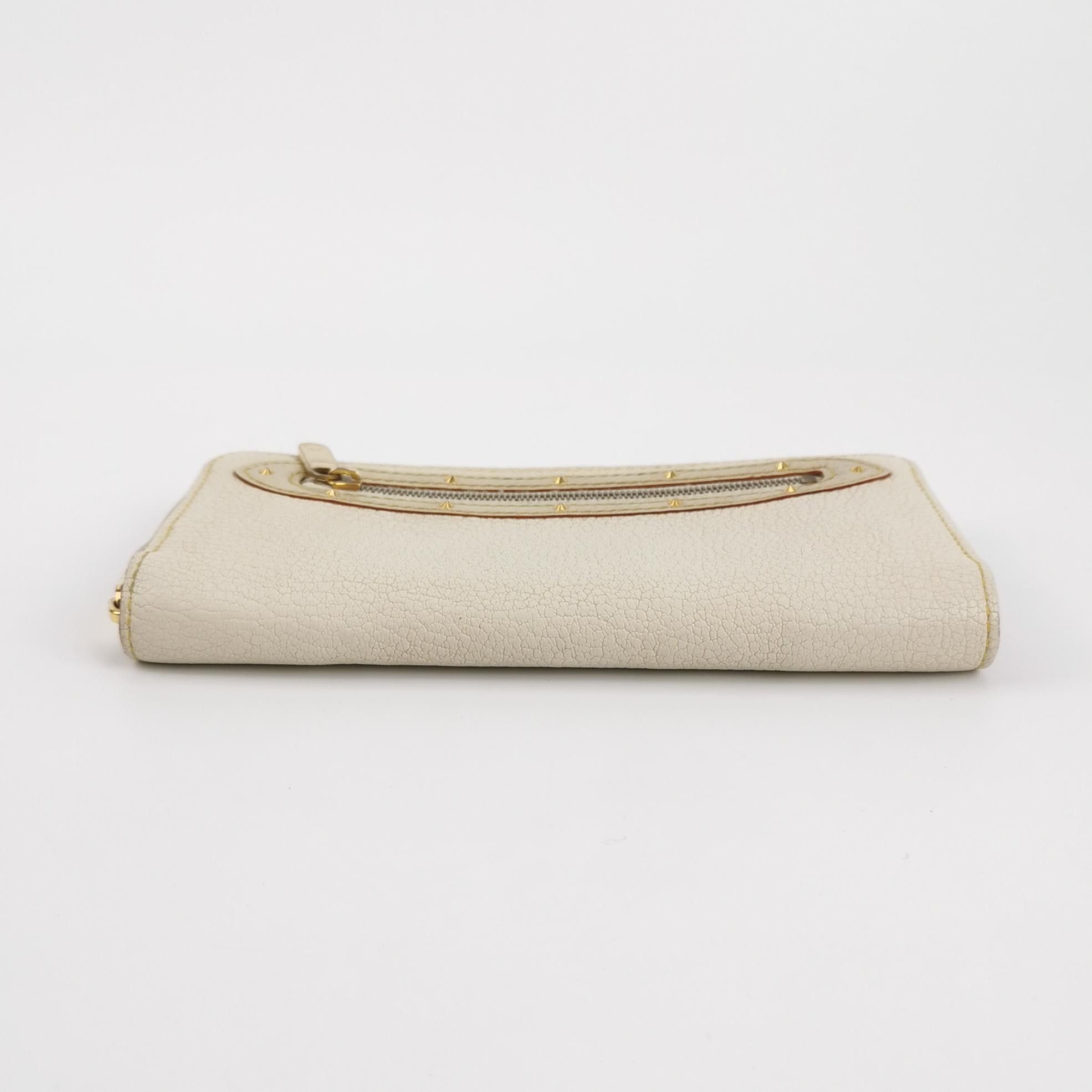 Louis Vuitton (LV) Suhali sheepskin zipper rivet clutch -y2