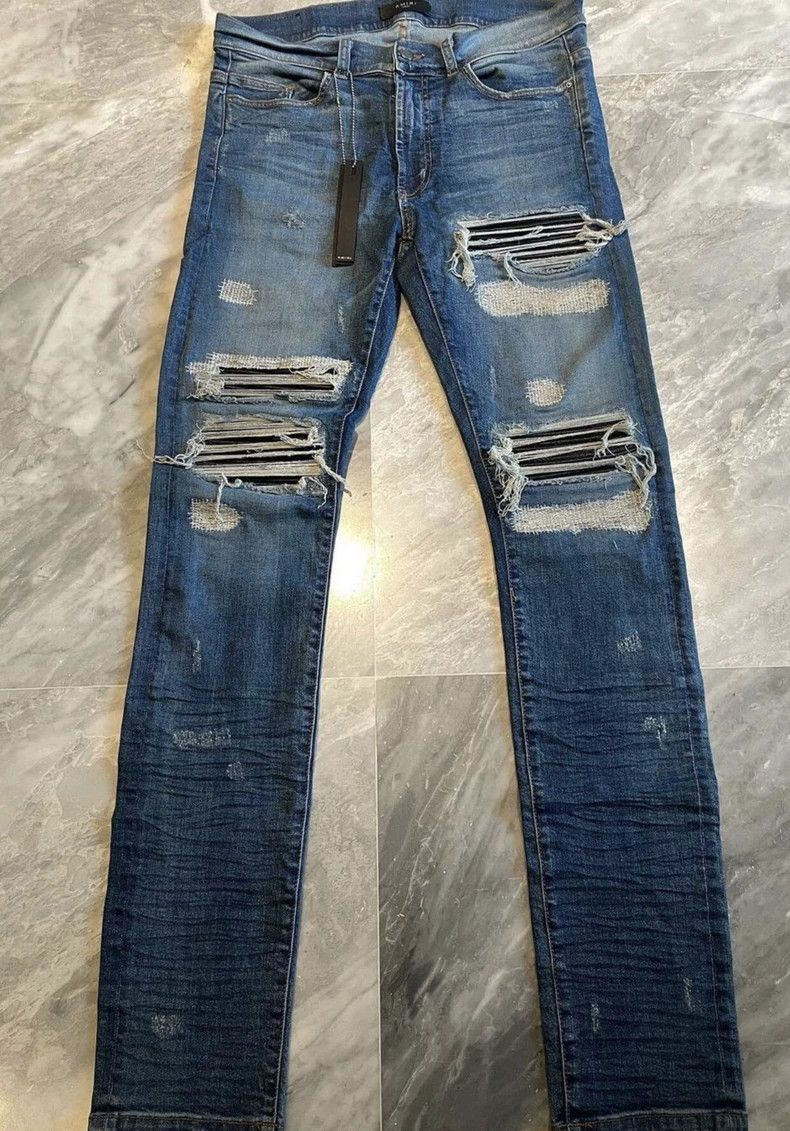 Amiri 15OG patched leather blue jeans