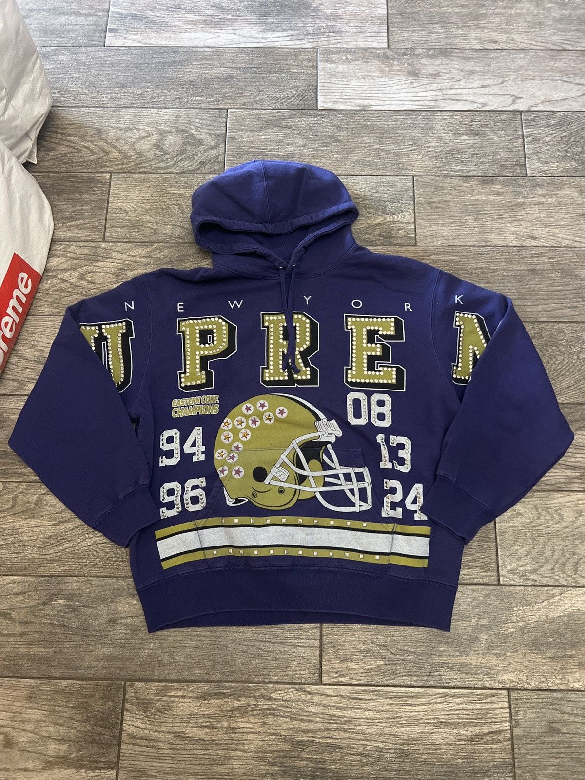 Supreme Supreme champions studded hooded sweatshirt | Grailed