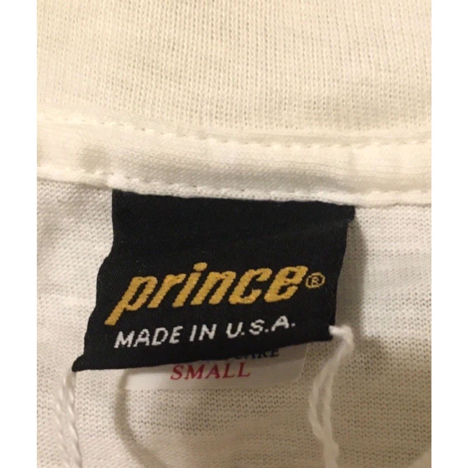 Prince VINTAGE Prince World Of Tennis Shirt S USA Abstract Grunge Track Sport 80s 90s White Men T-Shirt Size US S / EU 44-46 / 1 - 6 Thumbnail
