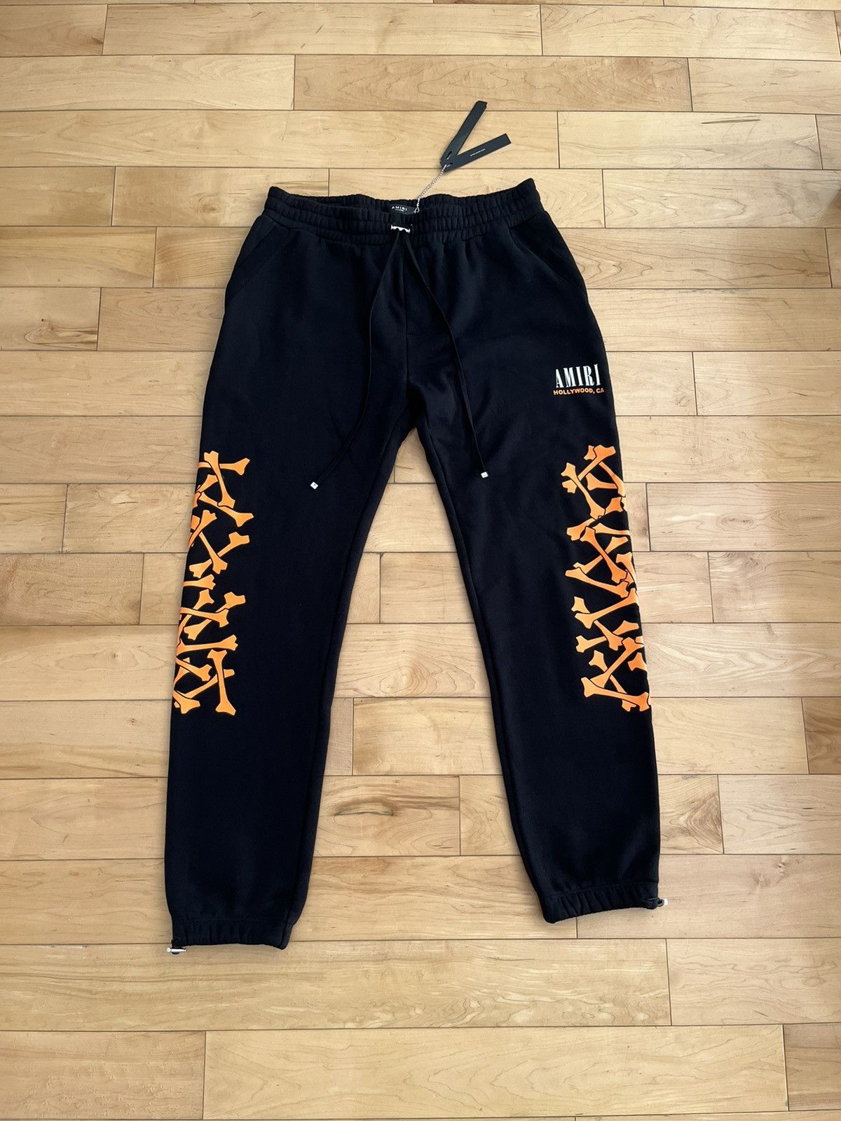 Image of NWT - Amiri Black & Orange Bones Sweatpant in Black/Orange, Men's (Size 38)