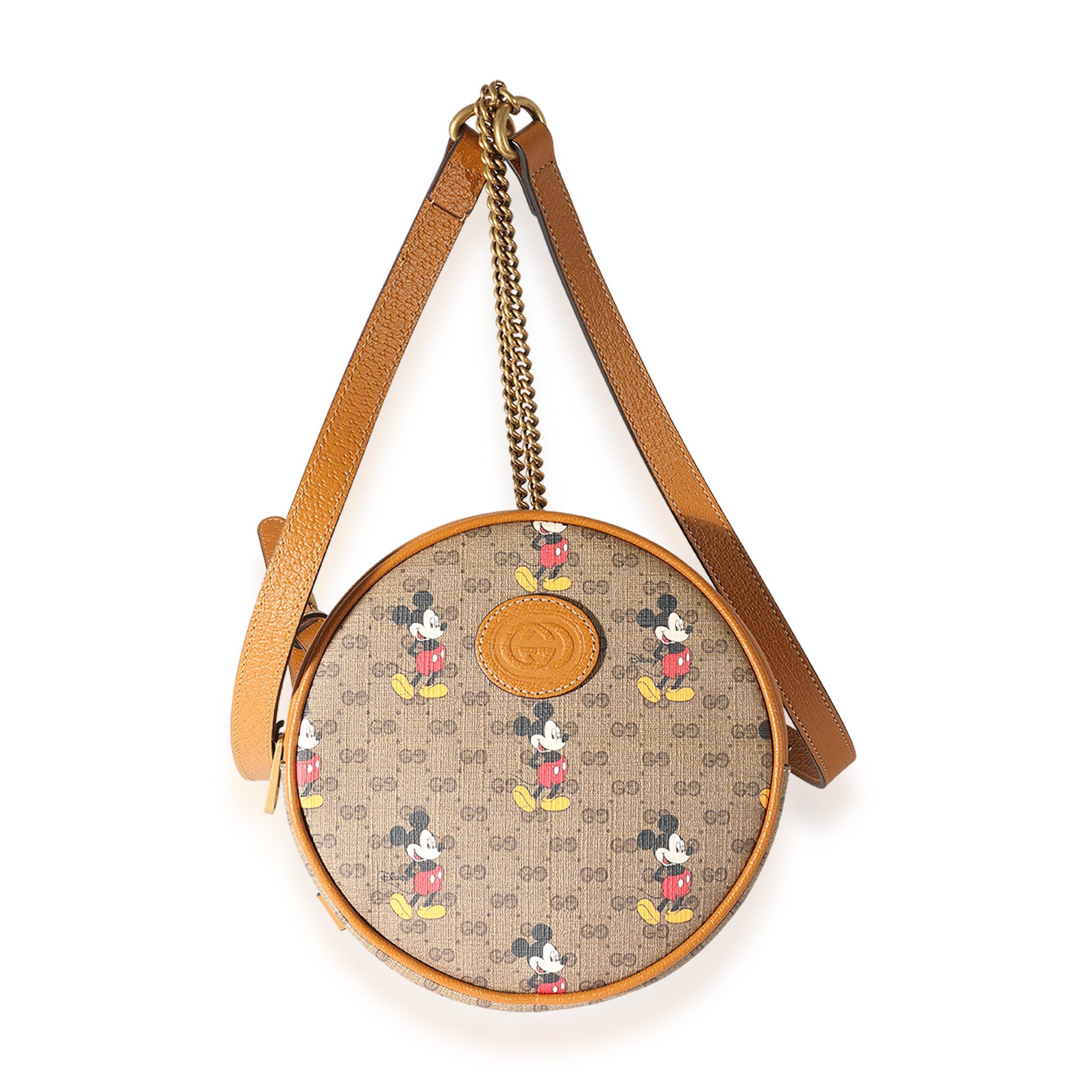 image of Gucci X Disney Vintage GG Supreme Mickey Mouse Mini Round Backpack in Brown, Women's
