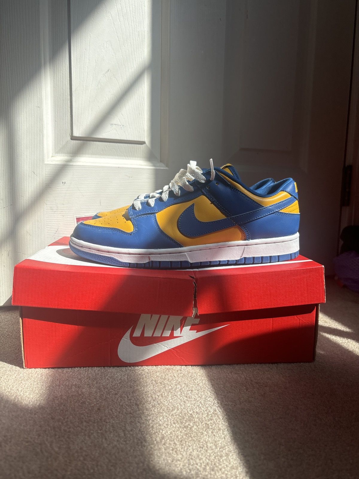 image of Nike Dunk Low Retro Ucla Shoes in Blue, Men's (Size 10)