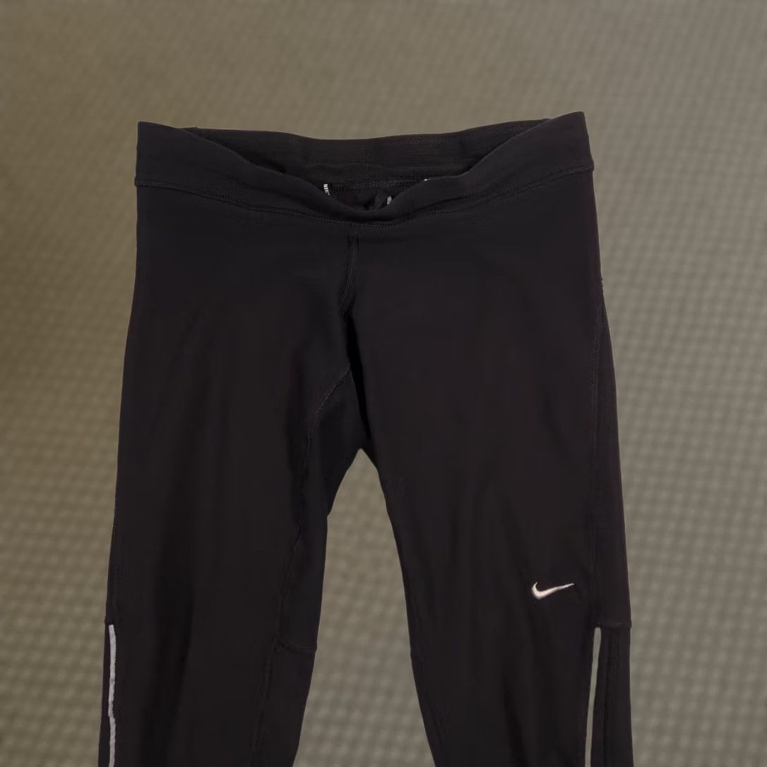 Nike Nike Dri-FIT Pants Womens Small Black Crop Running Leggings Zip Pocket Athletic Size 28" / US 6 / IT 42 - 1 Thumbnail