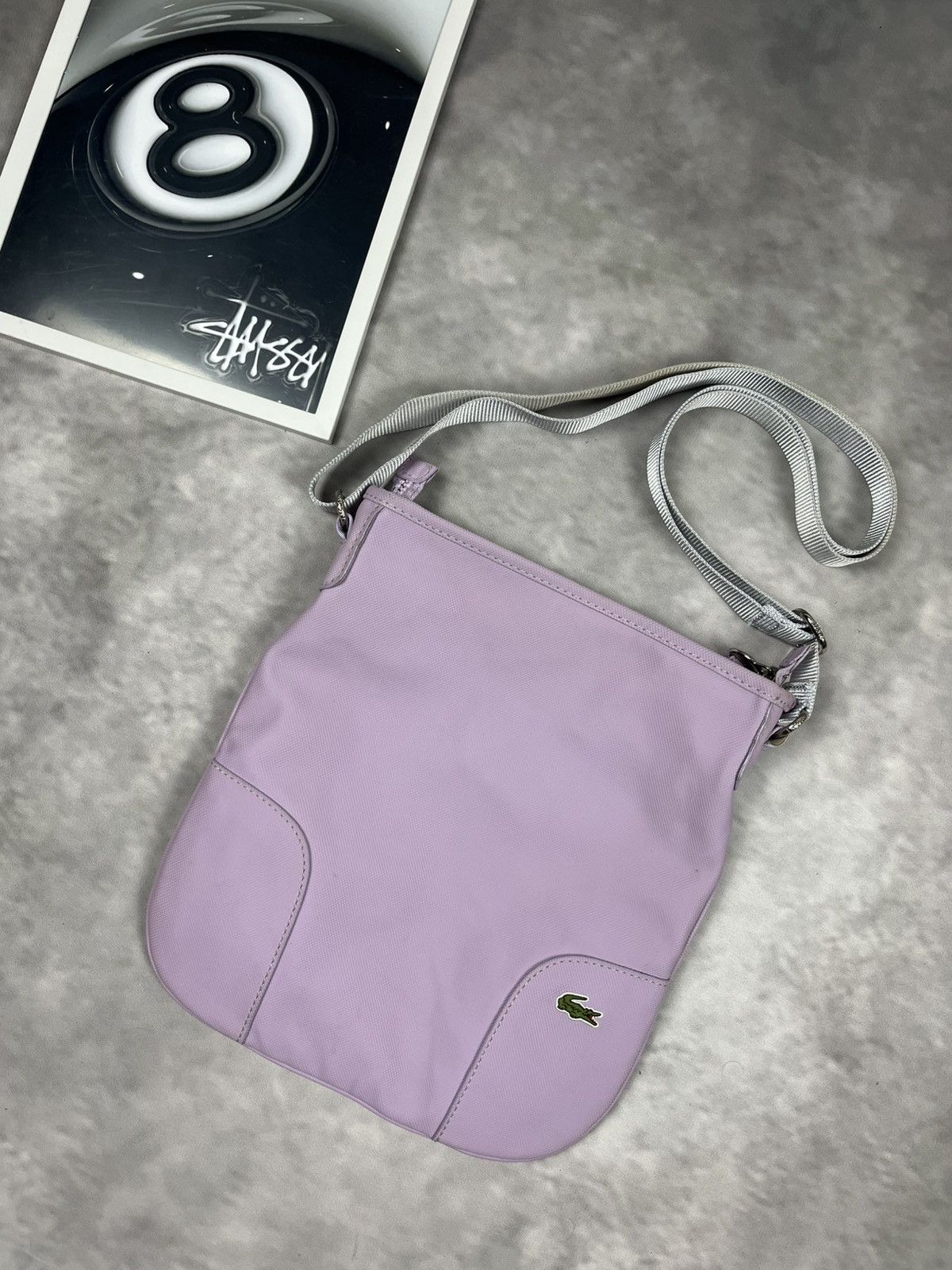 Lacoste Lacoste IUNU FLAT Lilac/Lavender Flat Crossbody Shoulder Bag Size ONE SIZE - 1 Thumbnail