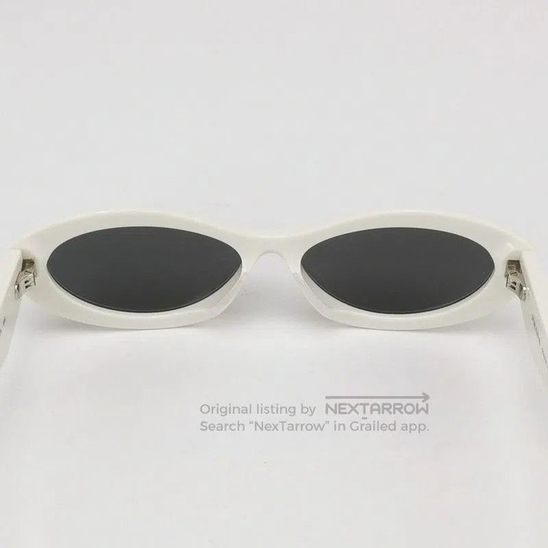 Prada Prada Logo Oval Frame Sunglasses in White. Size ONE SIZE - 7 Thumbnail