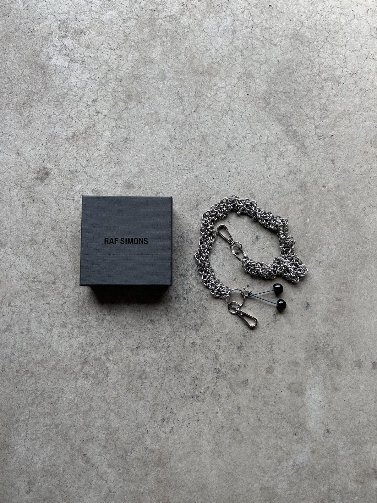 RAF SIMONS TWISTED cherry wallet-