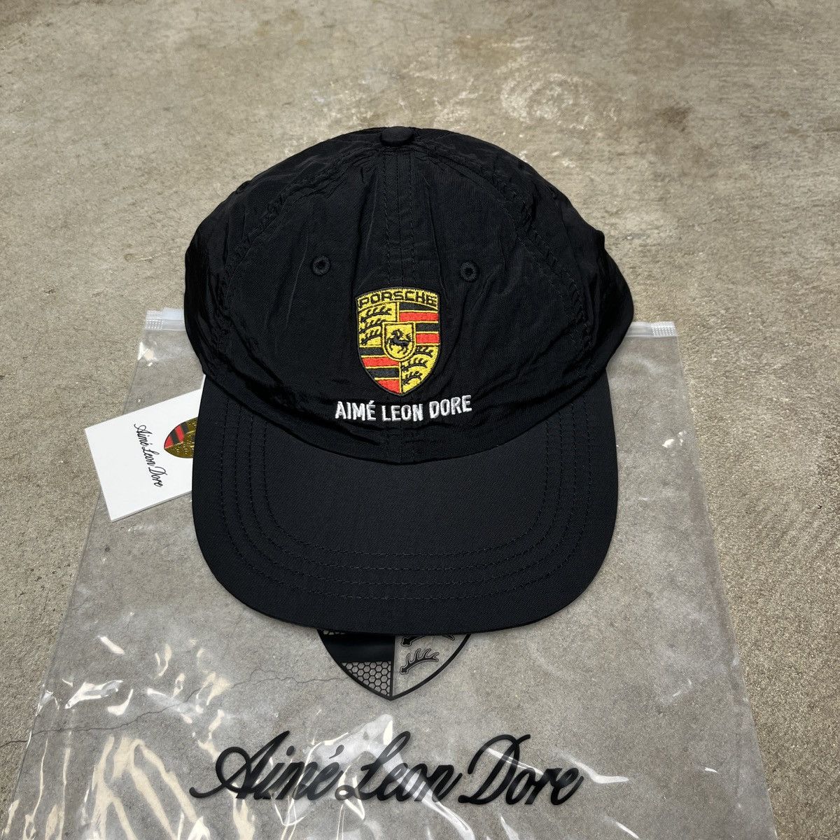 Aime Leon Dore Aime Leon Dore Porsche Logo Hat Jet Black Size ONE SIZE - 1 Thumbnail