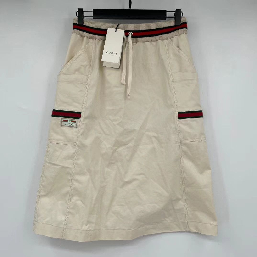 Gucci Gucci beige patch letter skirt Nextarrow-2412 Size 28" / US 6 / IT 42 - 1 Thumbnail