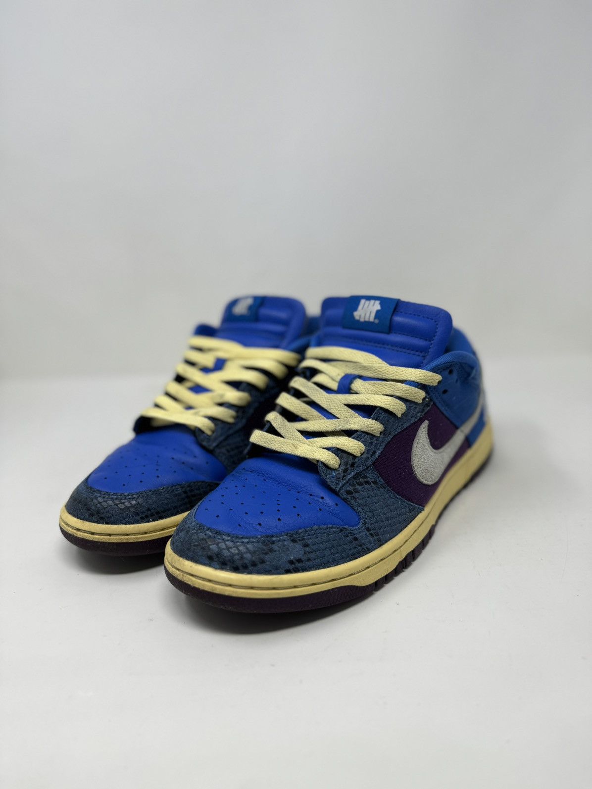image of Nike Dunk Low Undefeated Shoes in Blue, Men's (Size 10.5)