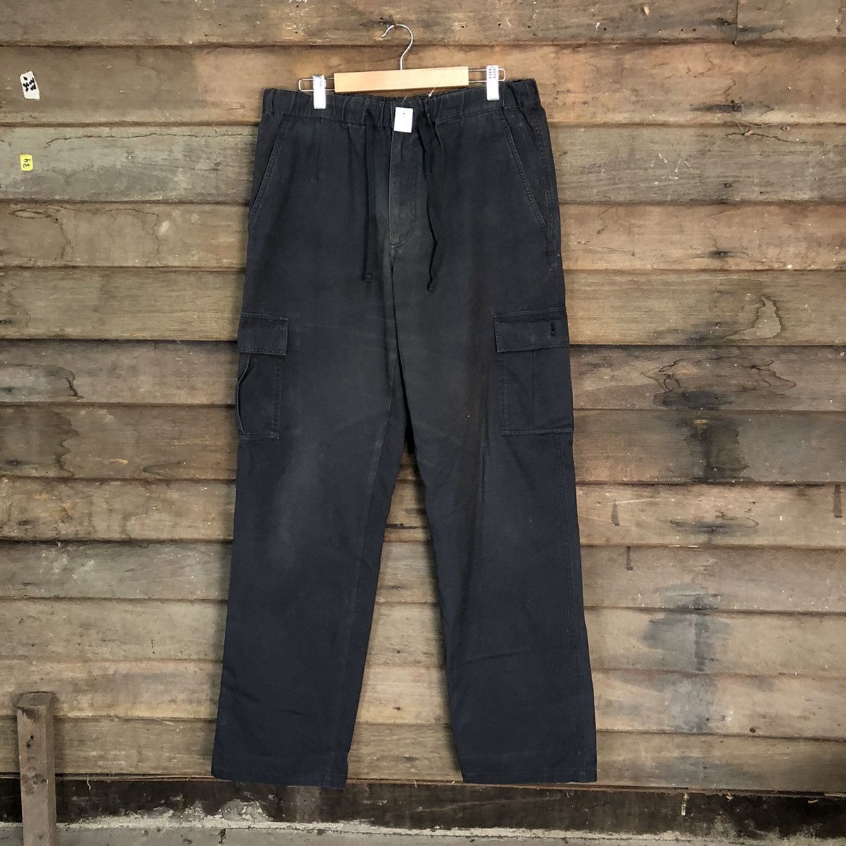 image of Vintage Uniqlo Dark Blue Cargo Multipocket Pants 7372, Men's (Size 30)