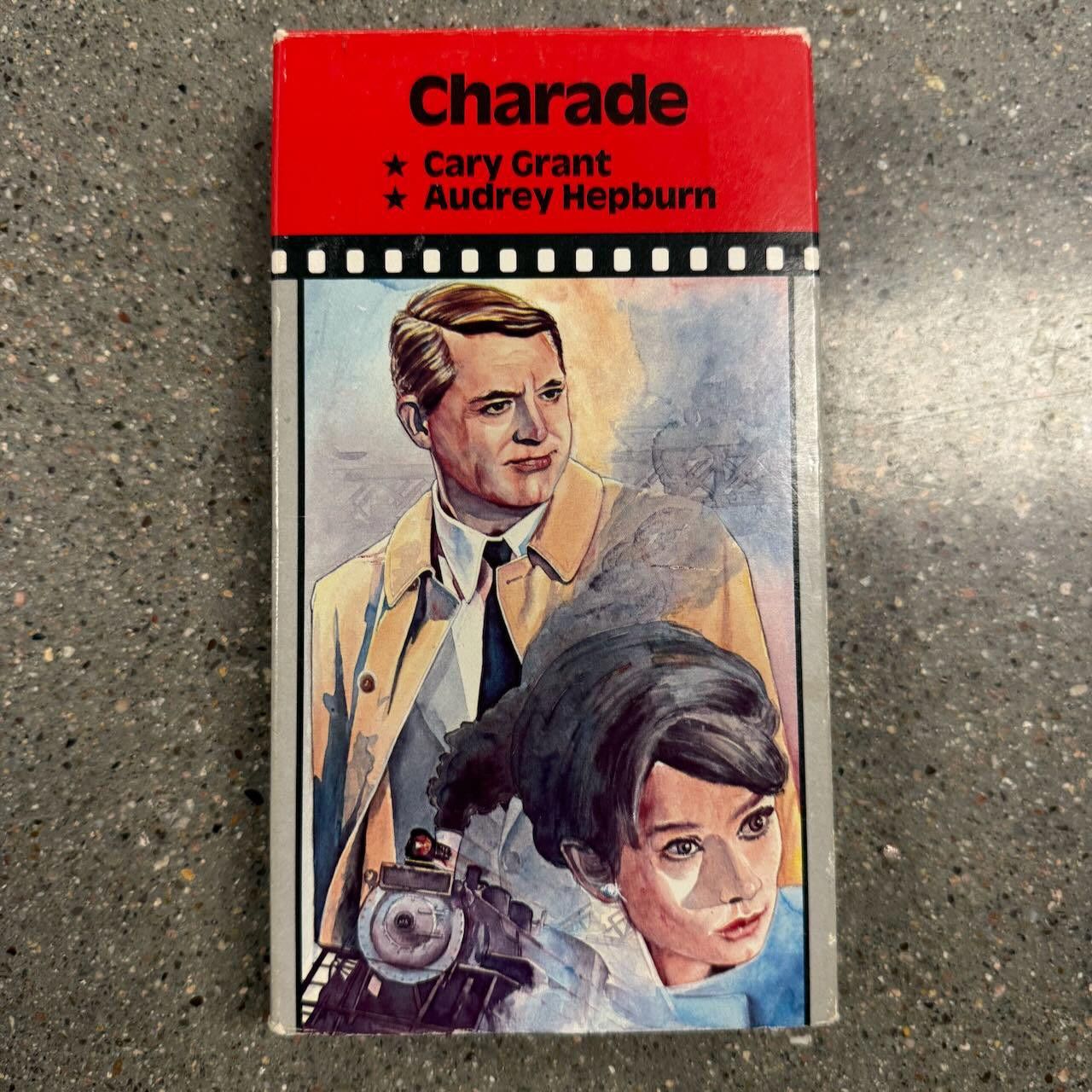 Designer Charade VHS 1964 Movie Video Treasures Audrey Hepburn Rare Size ONE SIZE - 1 Thumbnail