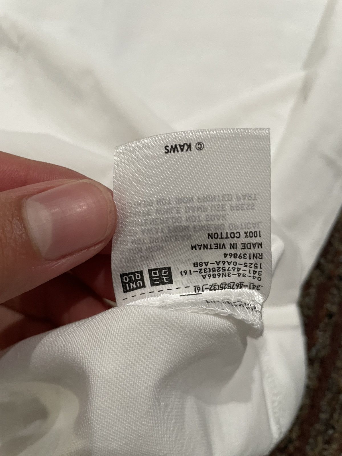 Uniqlo KAWS x Uniqlo UT Artbook Tee (Large) Size US L / EU 52-54 / 3 - 6 Thumbnail