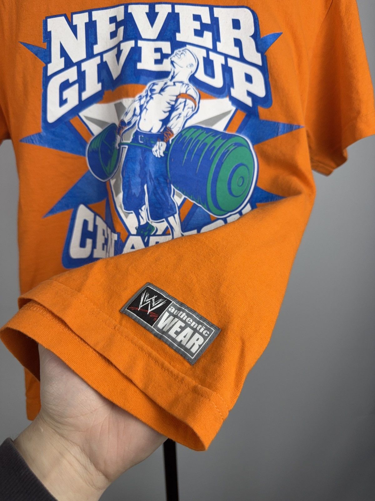 WWE WWE 2008 John Cena Never Give Up Tee Orange Youth L / S Size US S / EU 44-46 / 1 - 6 Thumbnail