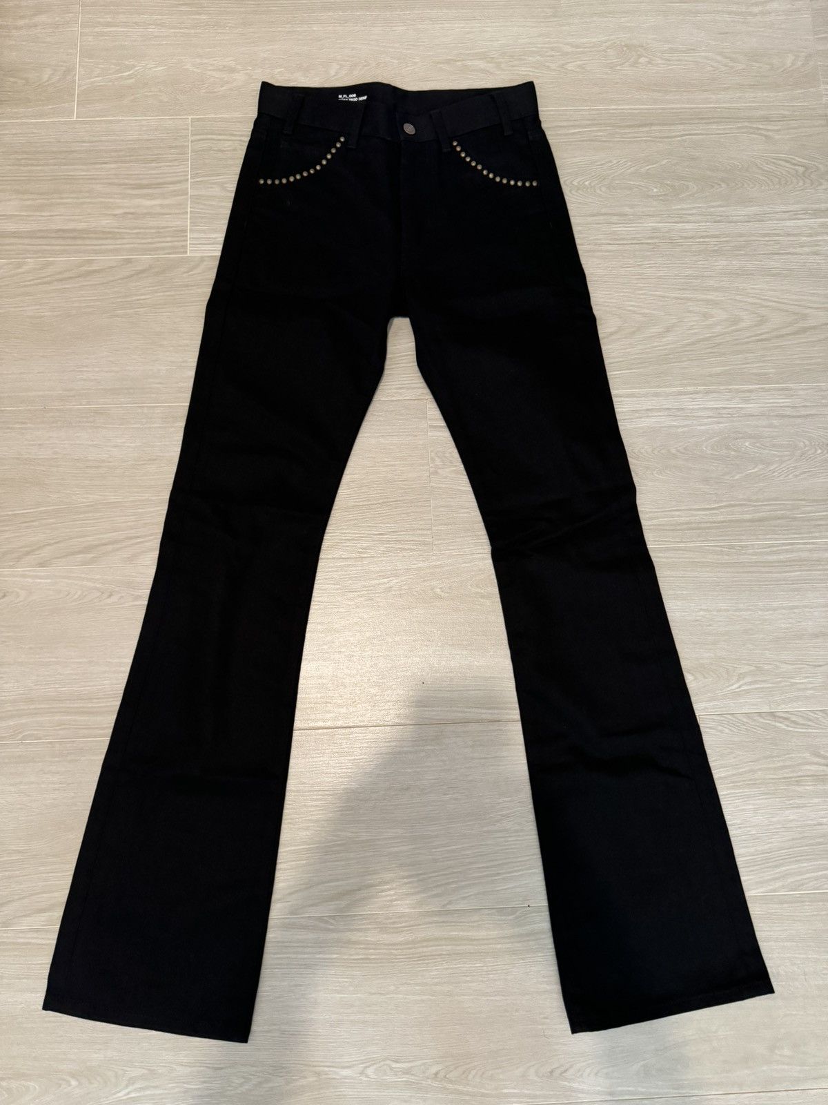 Celine × Hedi Slimane DYLAN FLARED JEANS IN PURE BLACK DENIM | Grailed