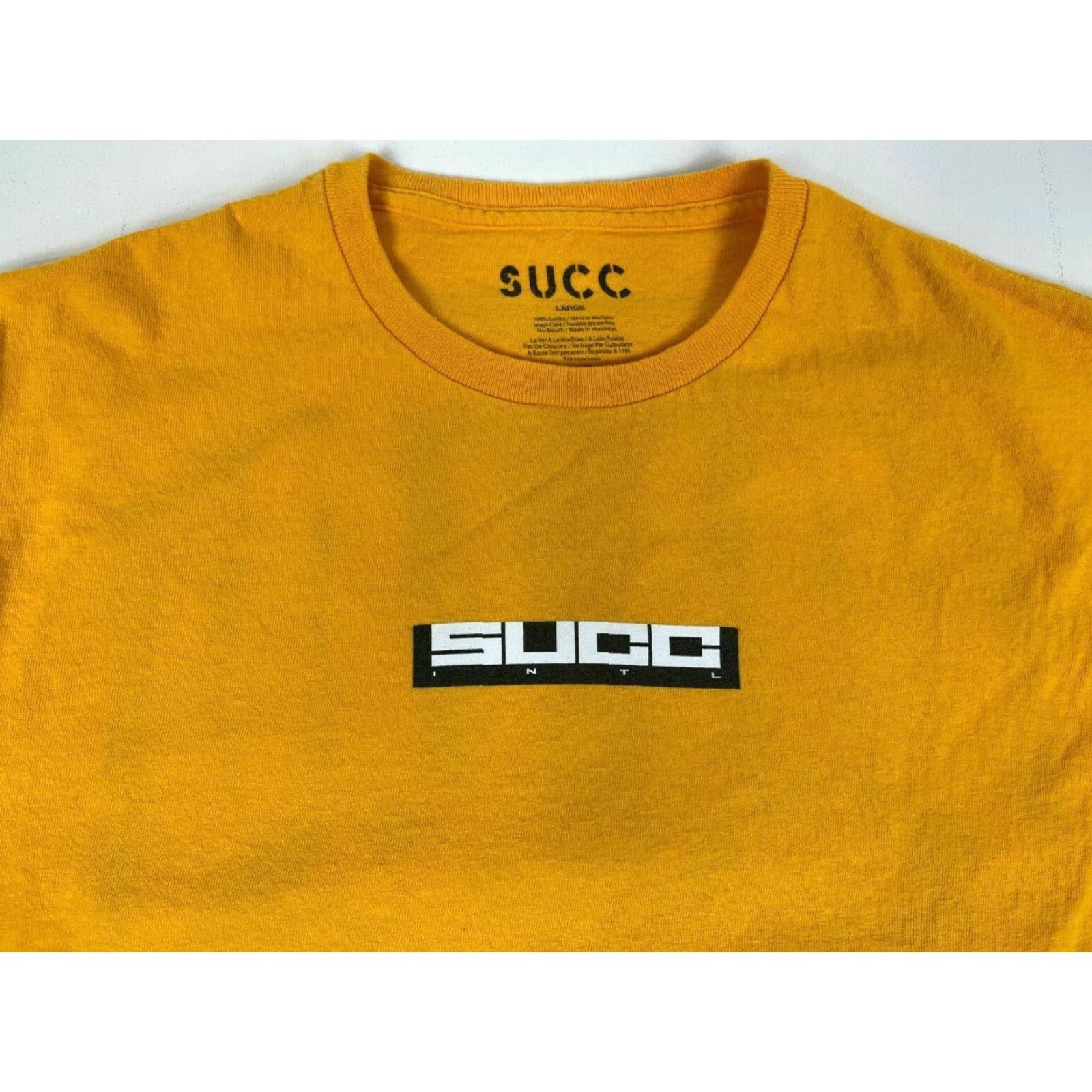 Vintage Succ International Men’s Long Sleeve T-Shirt Crew Neck Sz L Mustard Yellow Graphic Logo 100% Cotton Double-Sided Vintage? Size US L / EU 52-54 / 3 - 5 Thumbnail