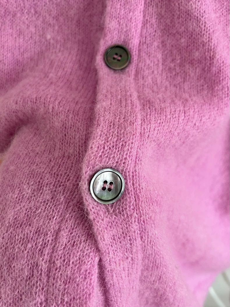 our legacy Pink sweater