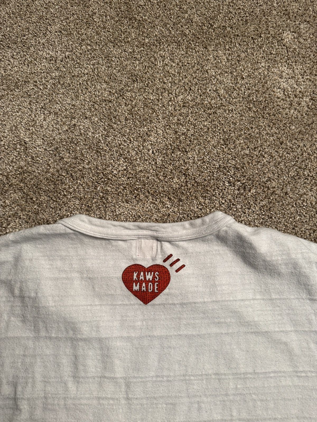Human Made × Kaws HUMAN MADE X KAWS “DRY ALLS” SLUB GRAPHIC TEE Size US L / EU 52-54 / 3 - 6 Thumbnail