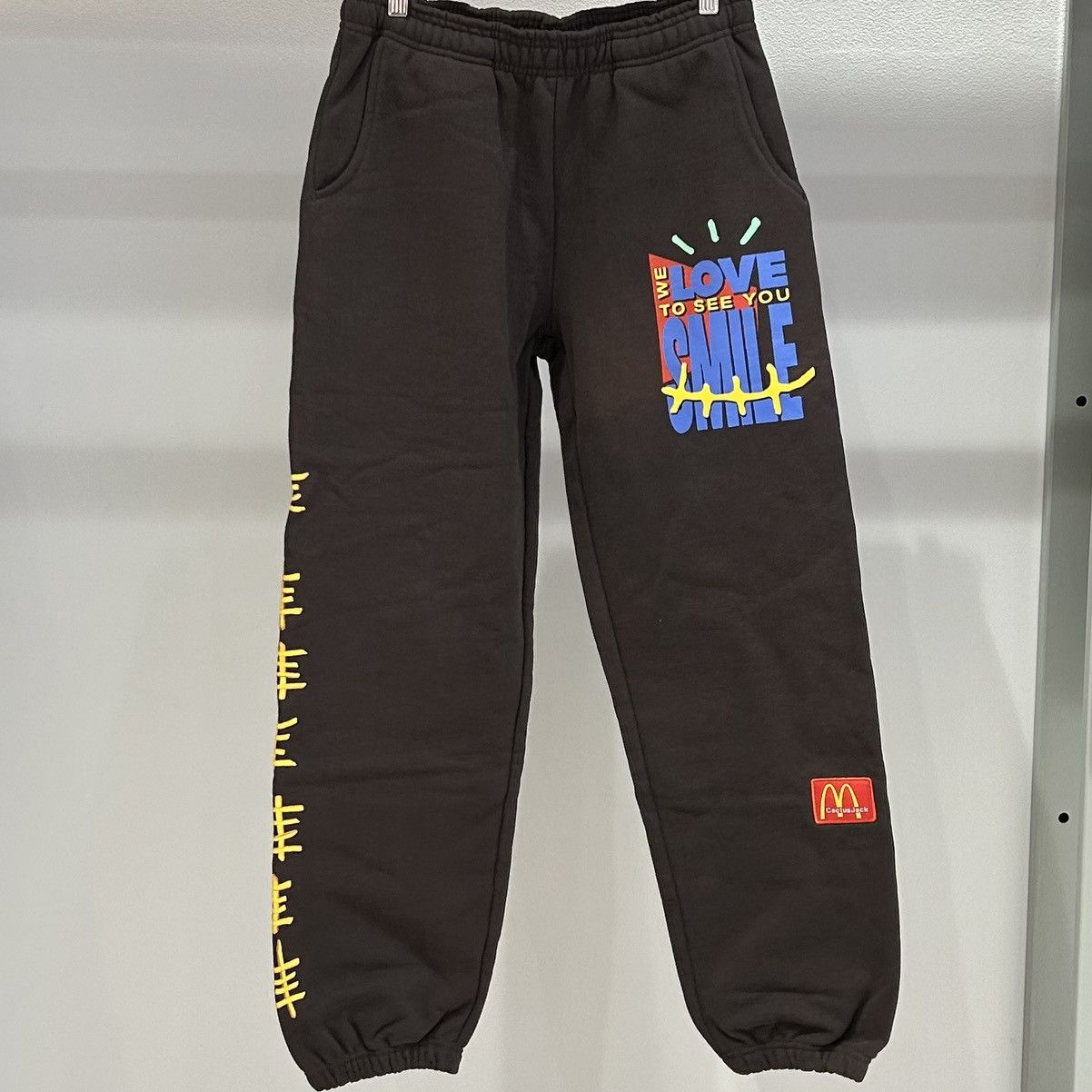 image of Travis Scott X Mcdonald's Smile Track Pants in Brown, Men's (Size 34)