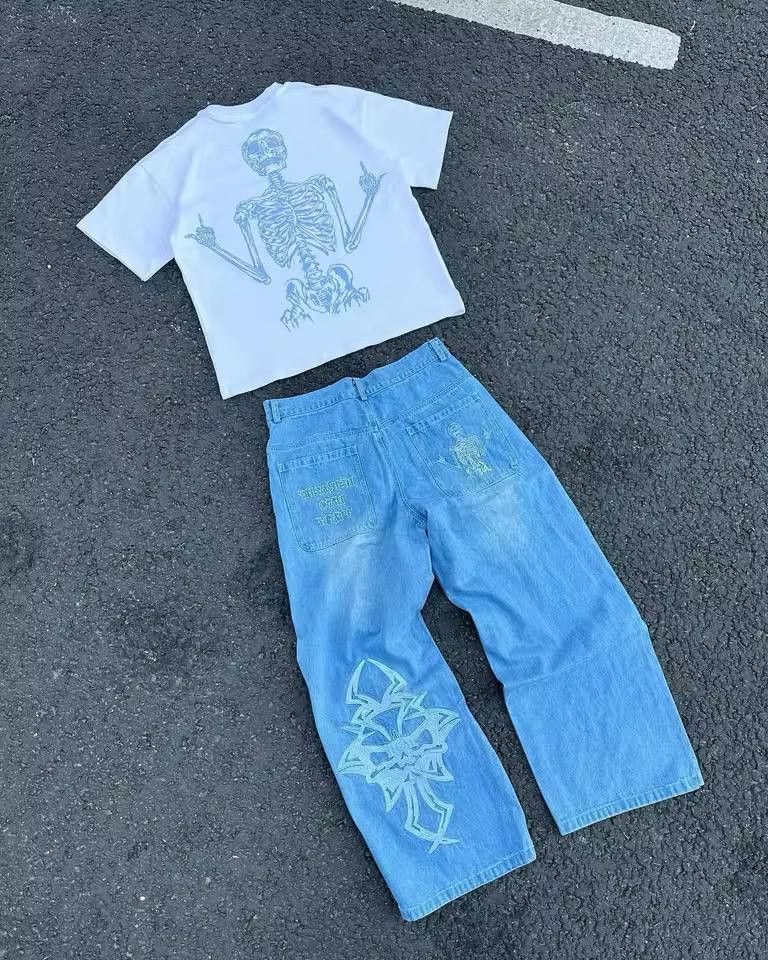 exclusive skeleton-embroidered jeans.