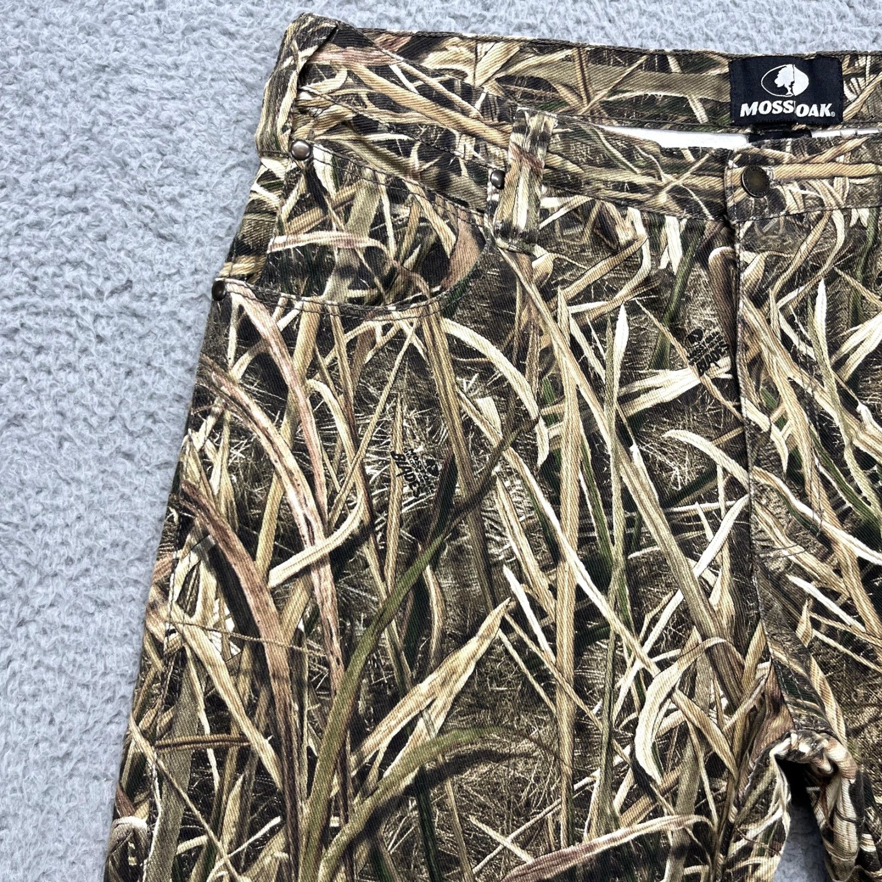Vintage Mossy Oak Pants Mens 38x31 Shadow Grass Blades Camo Denim Hunting Outdoor Pants Mens 38 Shadow Grass Blades Camouflage 5-Pocket Denim Workwear Mens Size US 38 / EU 54 - 3 Thumbnail