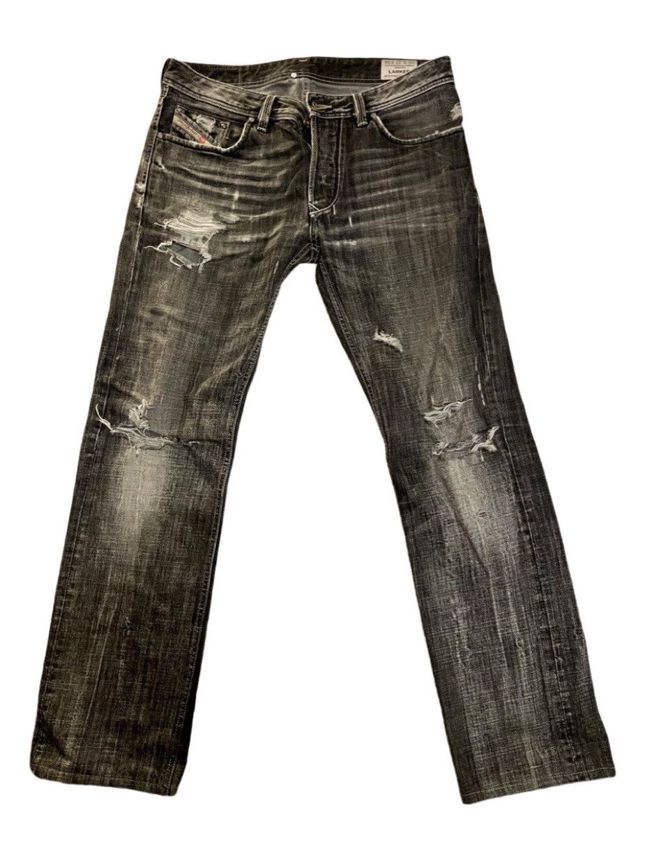 DIESEL DAMAGED DENIM PANTS INDUSTRY TAG