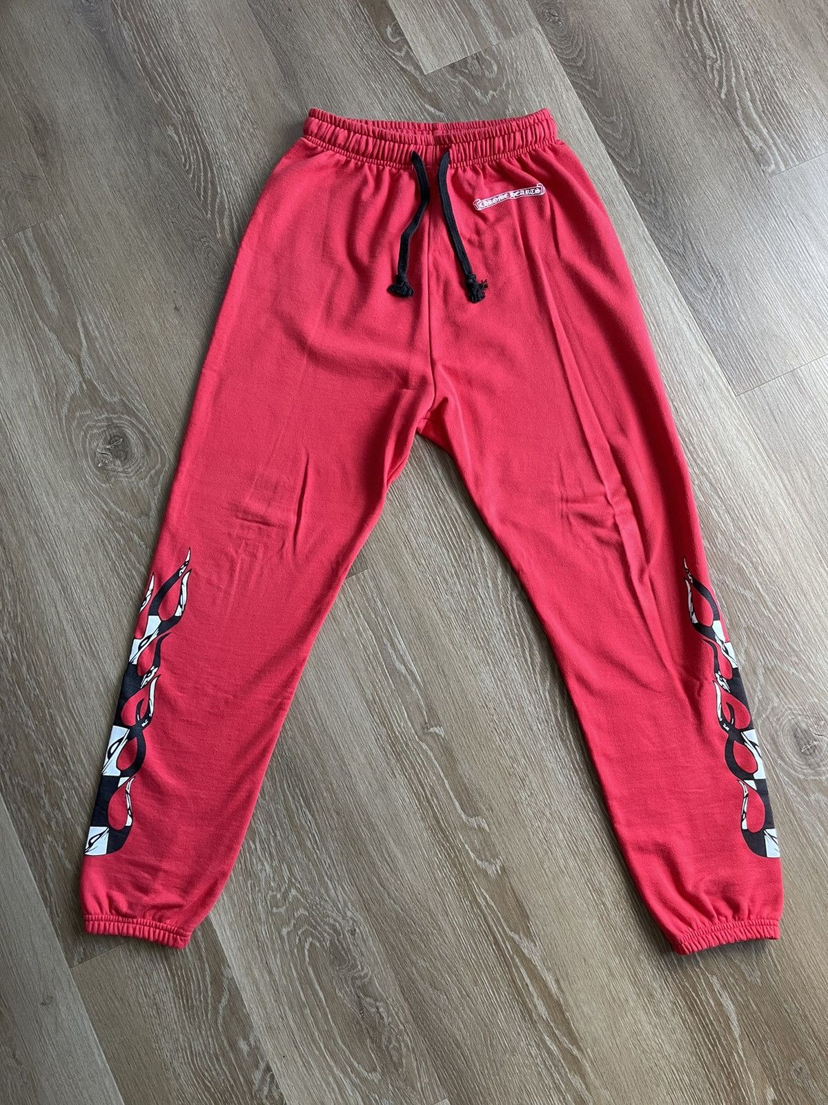 image of Chrome Hearts 99 Eyes Flames Sweatpants in Red, Men's (Size 30)