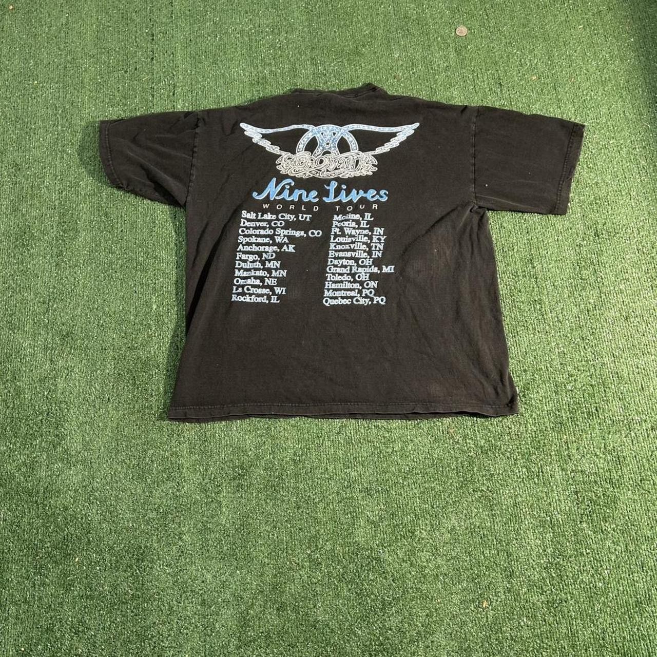 Giant insane grail 1997 Aerosmith Nine lives world tour tee Size US L / EU 52-54 / 3 - 4 Thumbnail