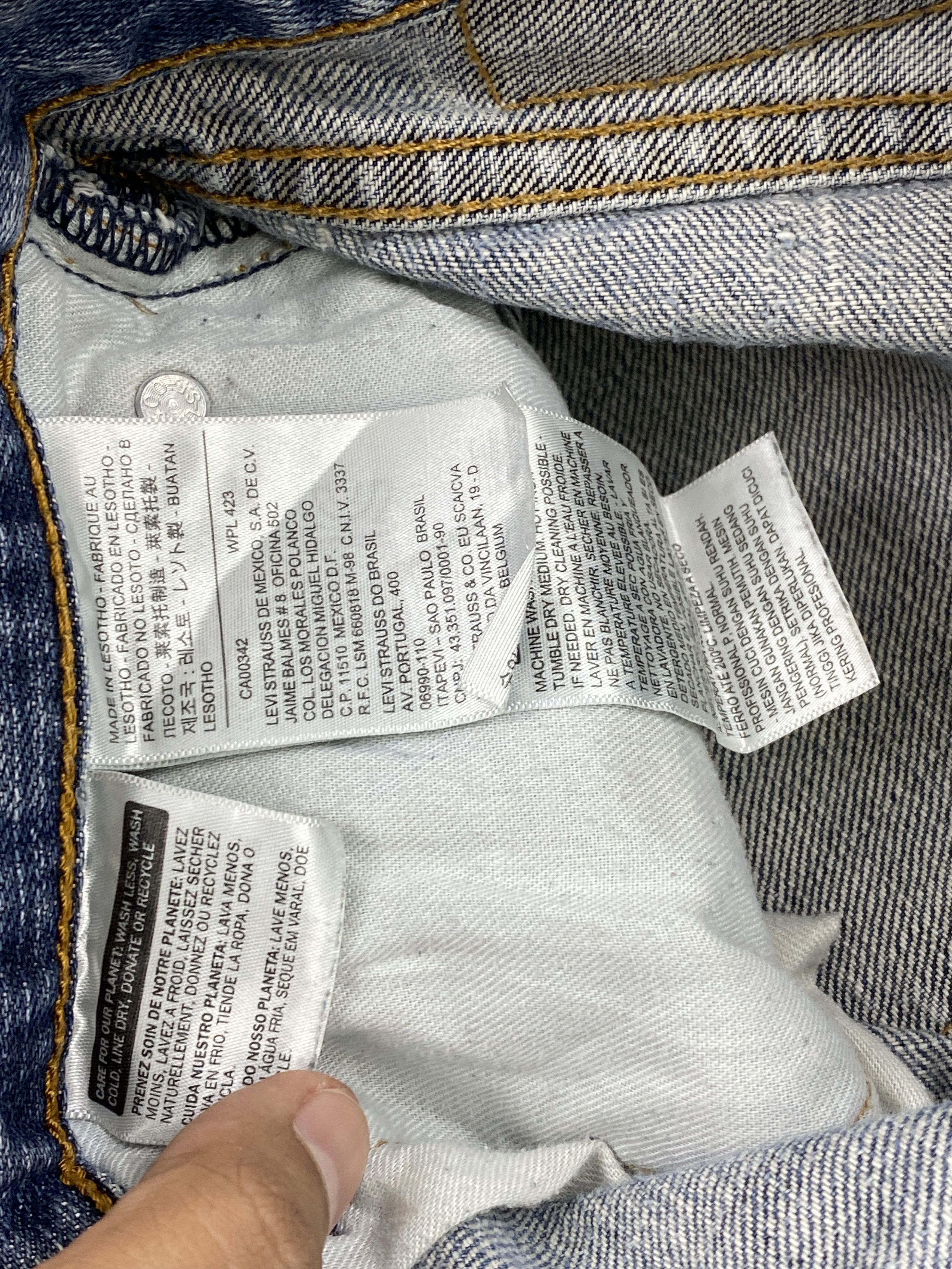 Distressed Vintage Levi's 505 Faded Blue Jeans