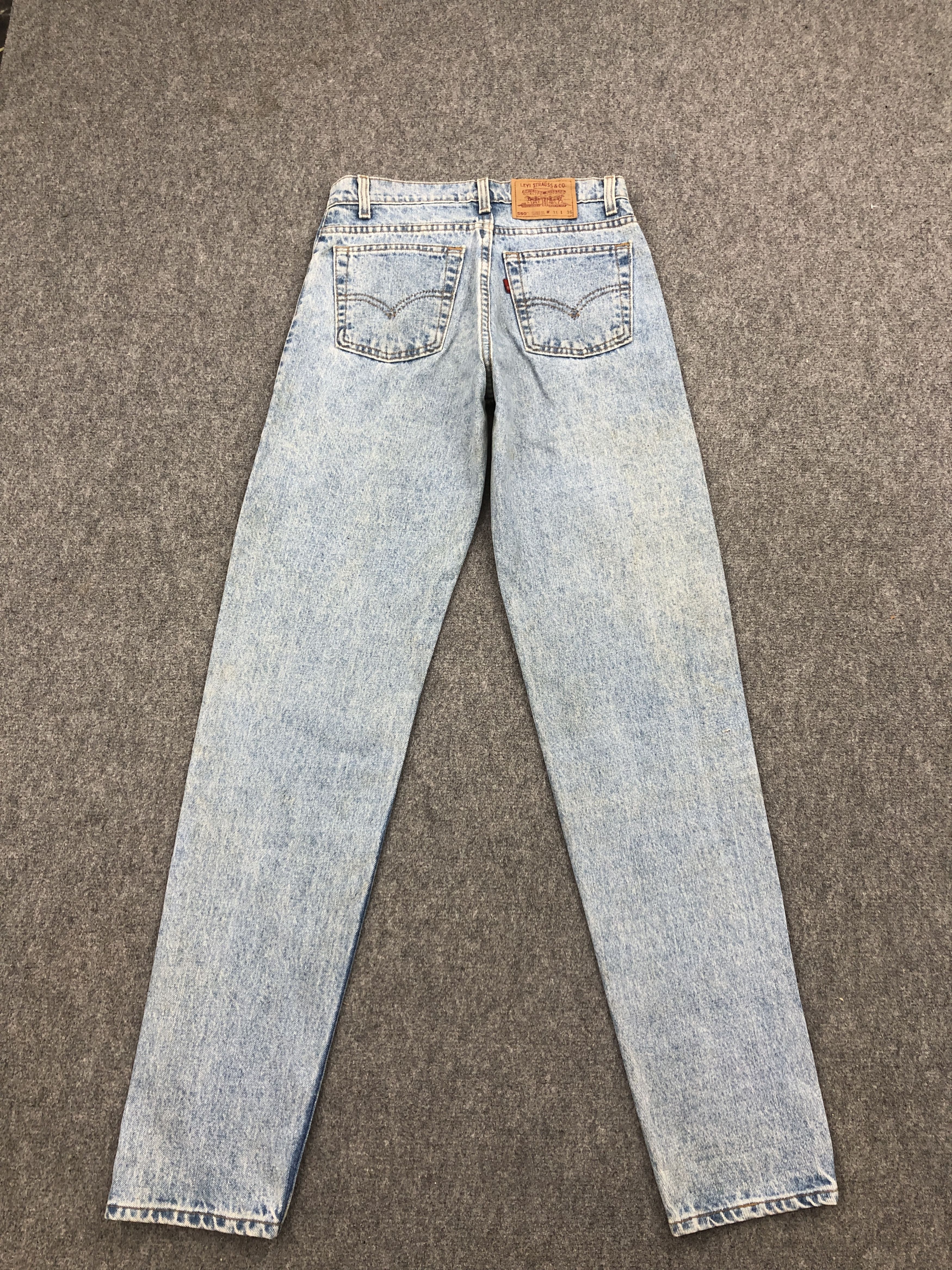 Distressed Vintage 90s Levi's 550 Light Washed Jeans