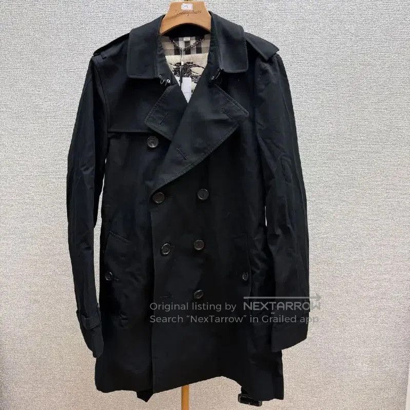 Burberry Women's Black Cotton Trench Coat.