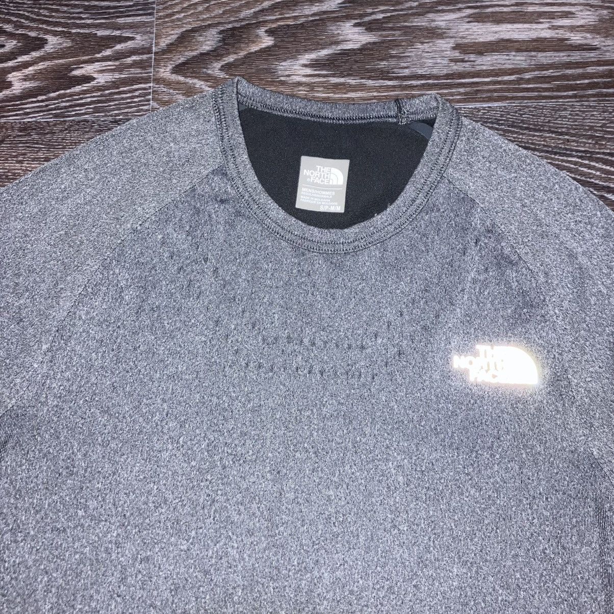 The North Face THE NORTH FACE Flight Series Reflective Logo L/S Base Layer Size US M / EU 48-50 / 2 - 4 Thumbnail