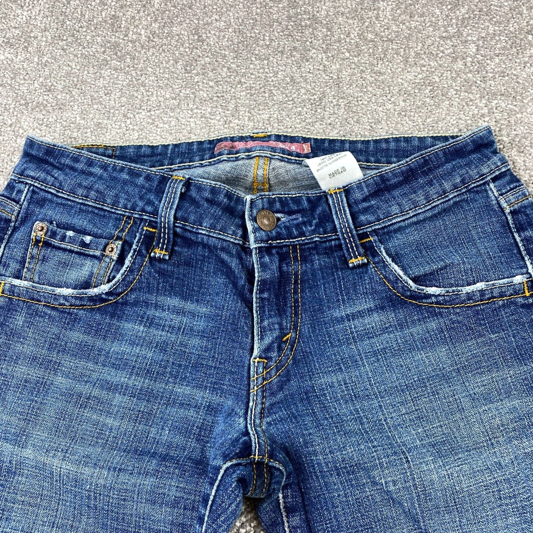 Levi s Juniors 9M Blue Medium Wash Flap Pocket Super Low Flare Jeans by Levi s 524 Too Collection Grailed