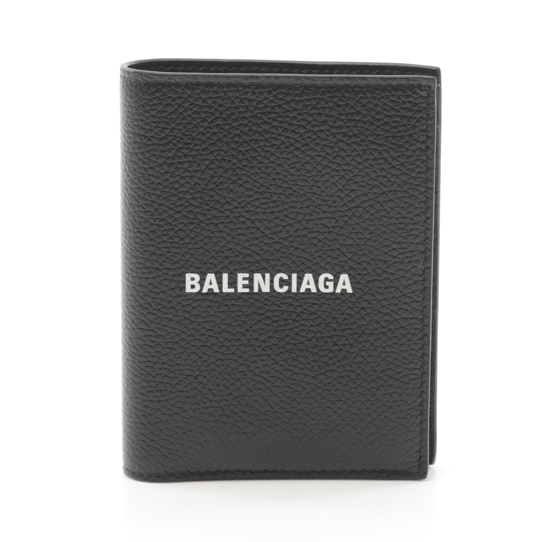 Balenciaga Balenciaga Cash Vertical Bi-Fold Wallet Leather Black Size ONE SIZE - 1 Thumbnail