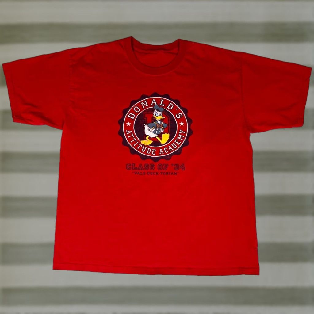 Disney VINTAGE Walt Disney World Men's T-Shirt Class of '34 Donald's Attitude Academy Sz L Red Crew Neck Short Sleeve Graphic Print (Double-Sided) Size US L / EU 52-54 / 3 - 1 Thumbnail