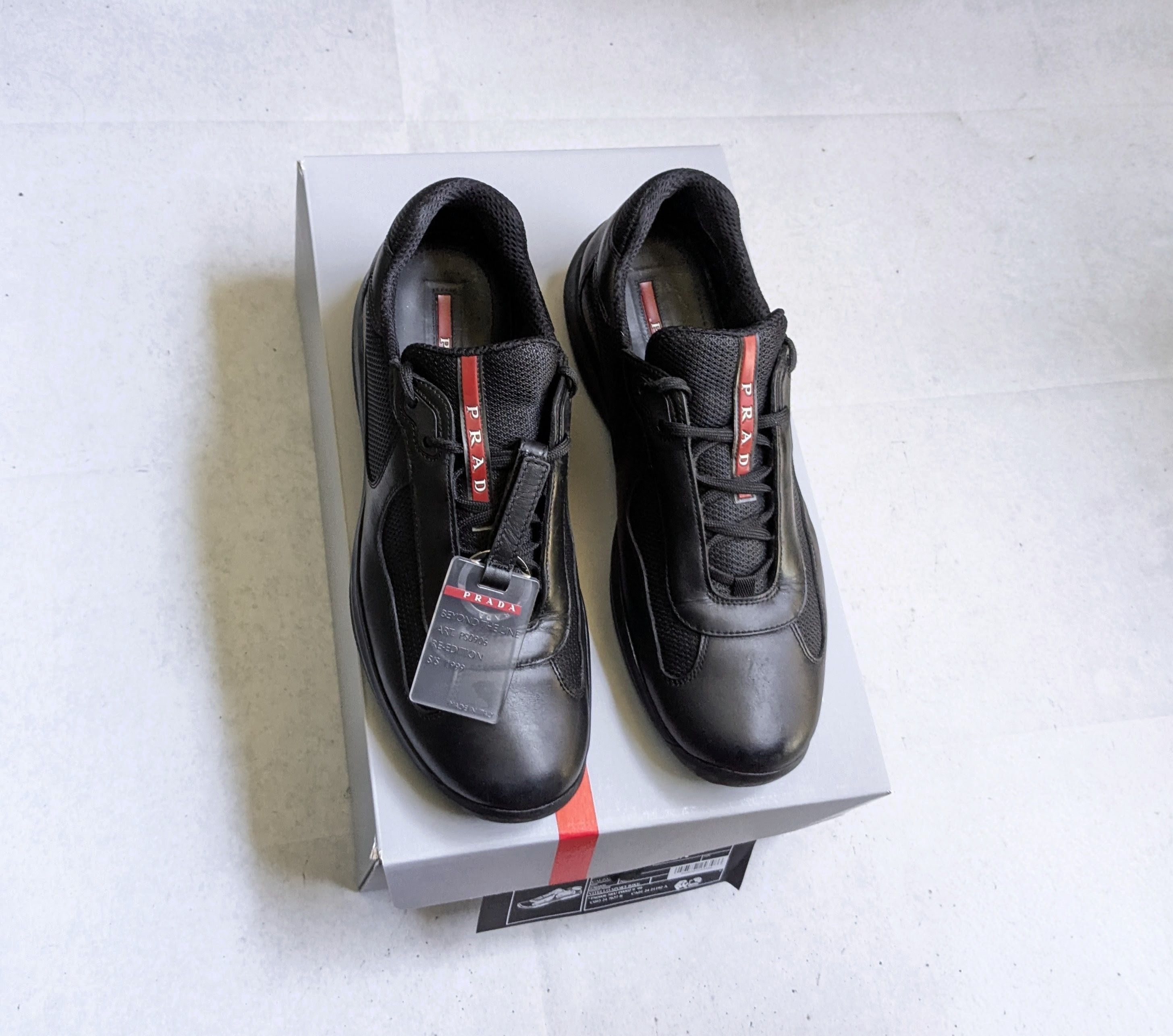 Prada Prada Cloudbust Sneakers black/red 20G 064 | Grailed