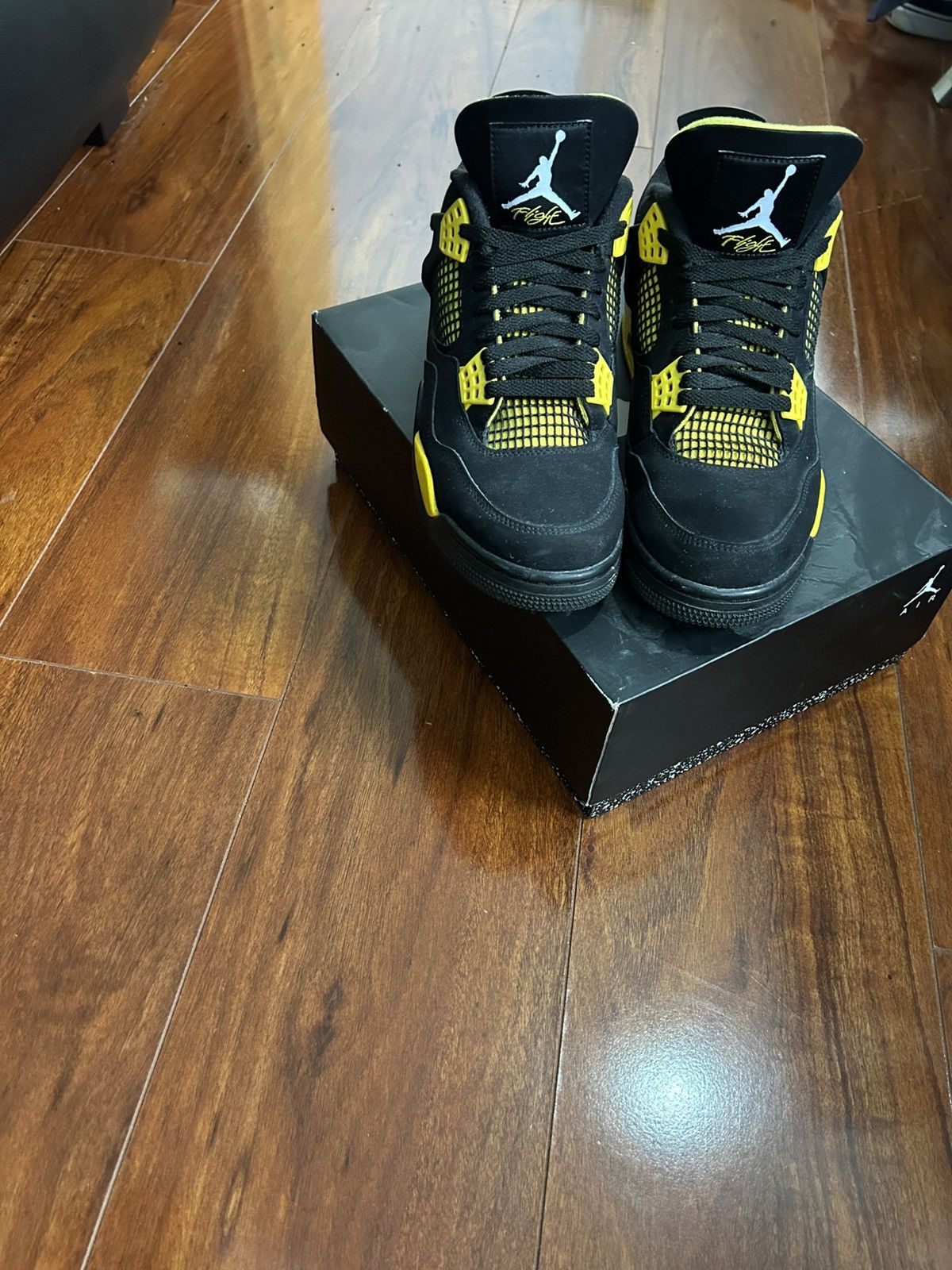 Nike Jordan 4 Retros black and yellow Size US 9 / EU 42 - 2 Thumbnail