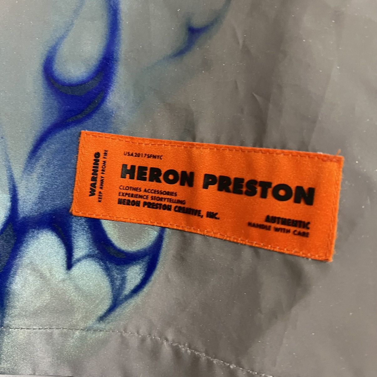 Heron Preston Mens Heron Preston Reflective Shirt Grey Flames Skull Size US M / EU 48-50 / 2 - 11 Thumbnail