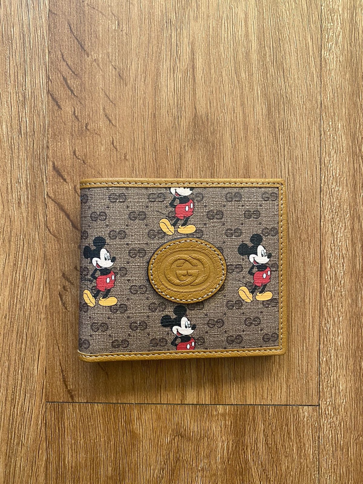 image of Disney x Gucci Mini GG Supreme Mickey Mouse in Brown, Men's